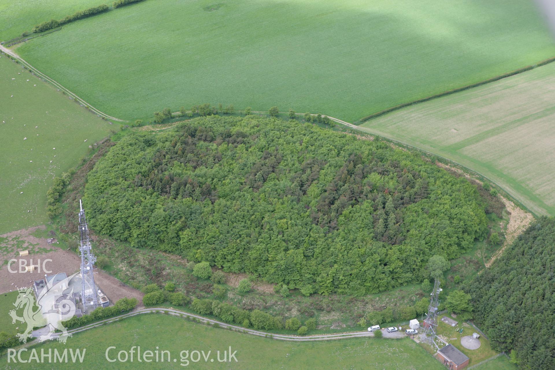 RCAHMW colour oblique photograph of Beacon Ring fort (Caer Digoll). Taken by Toby Driver on 27/05/2010.