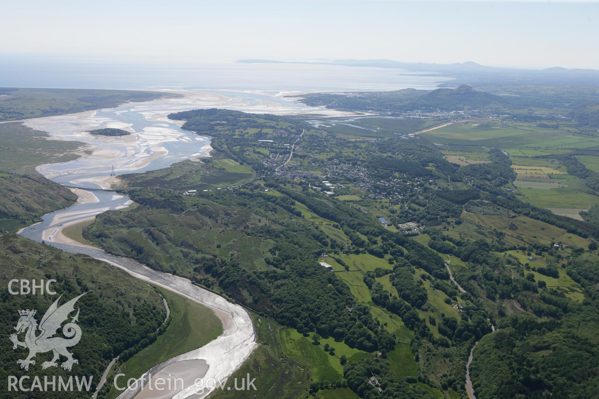 RCAHMW colour oblique photograph of Pont Brivet (Traeth Bach Railway Viaduct), with landscape over Tremadog Bay. Taken by Toby Driver on 16/06/2010.