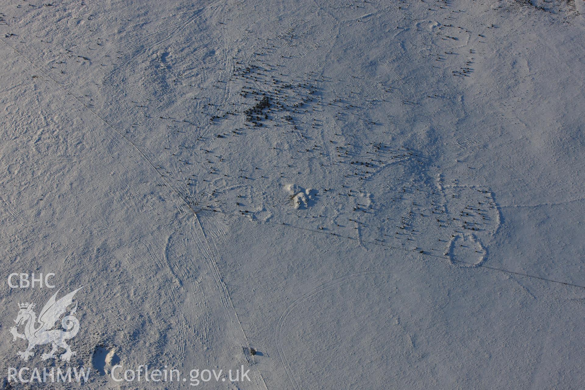 RCAHMW colour oblique photograph of Bernard's Well Mountain, prehistoric settlement. Taken by Toby Driver on 01/12/2010.