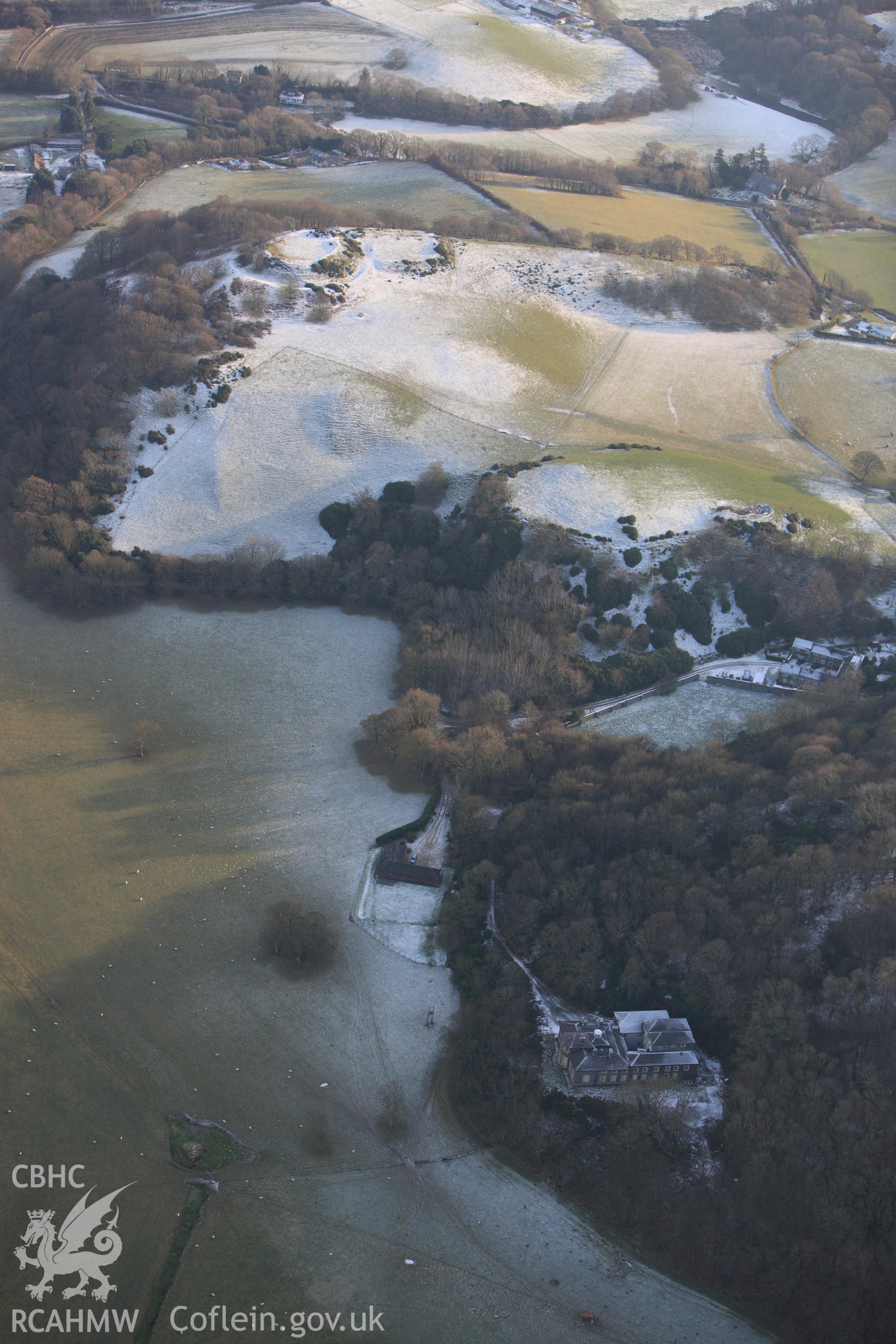 RCAHMW colour oblique photograph of Castell Tan y Castell, with snow. Taken by Toby Driver on 02/12/2010.