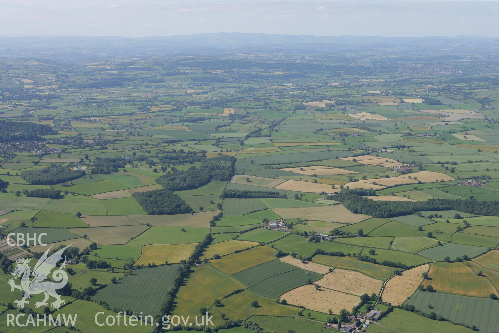 RCAHMW colour oblique photograph of Offa's Dyke, section from Dudston Covert, Lymore to Lack Brook, Church Stoke. Taken by Toby Driver on 21/06/2010.