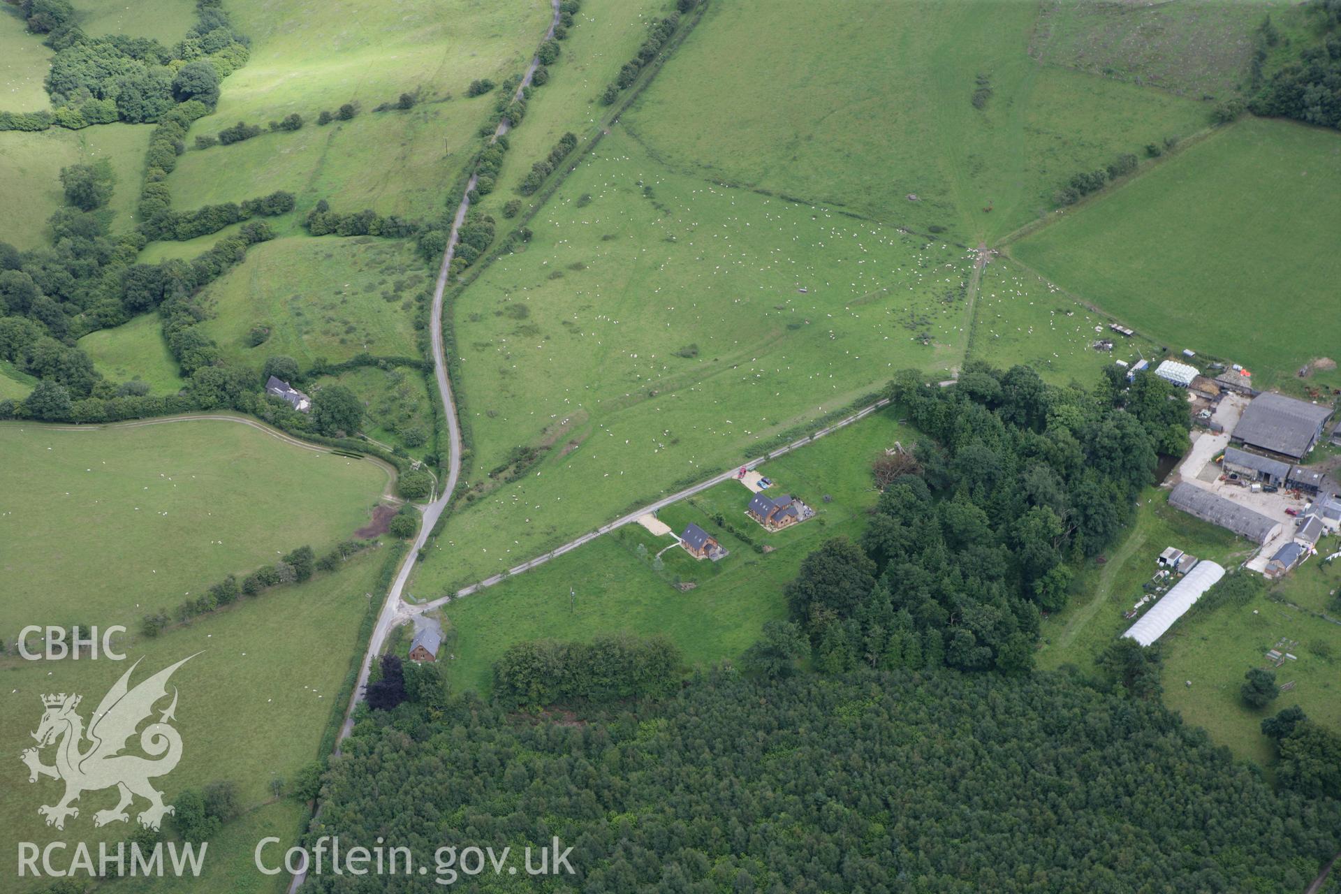 RCAHMW colour oblique photograph of Offa's dyke, section extending 1960m from Yew Tree Farm to quarries north-east of Granner Wood. Taken by Toby Driver on 21/07/2010.