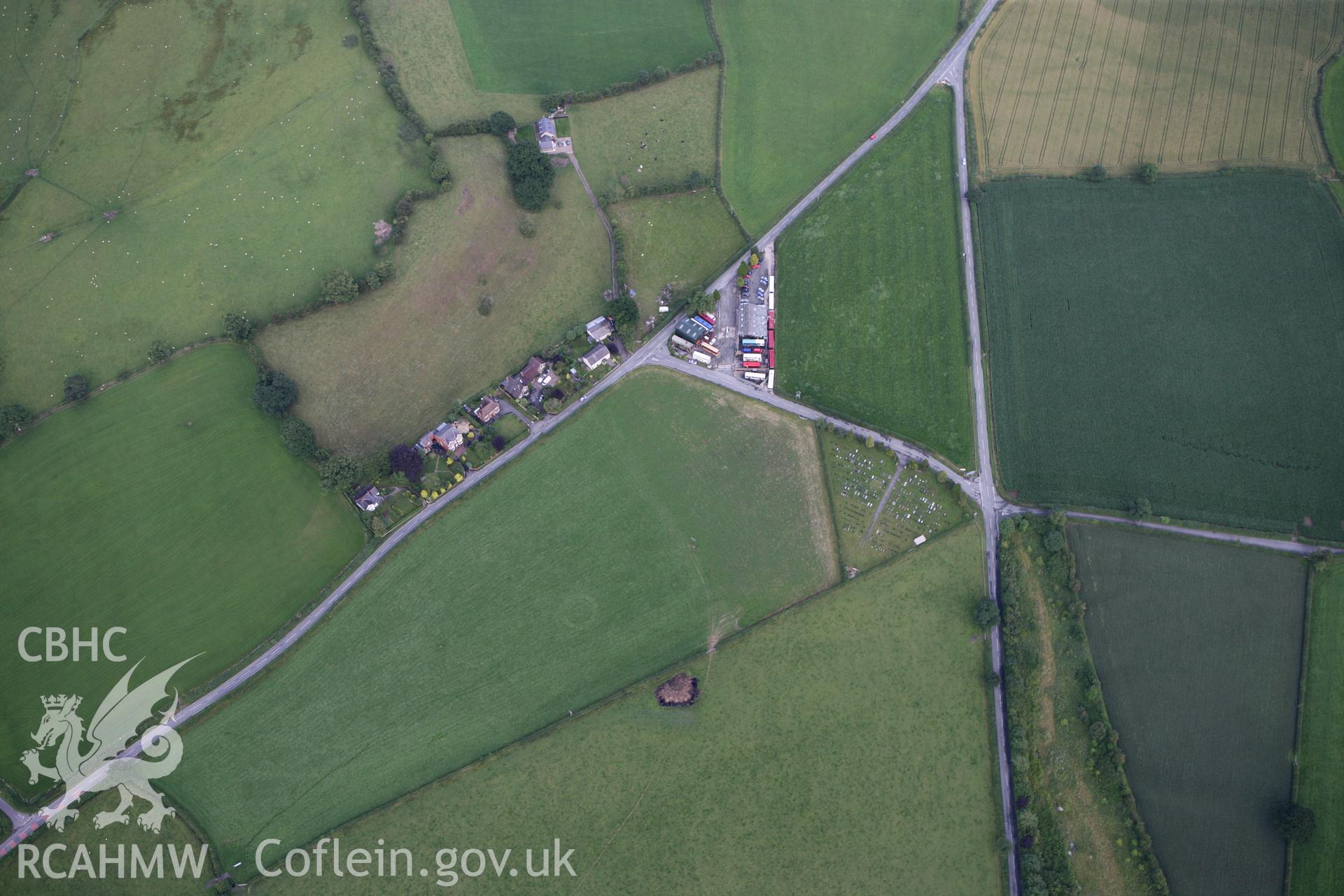 RCAHMW colour oblique photograph of Llanrhaedr-ym-Mochnant Crop Marks West of Meusydd Smithy. Taken by Toby Driver on 21/07/2010.