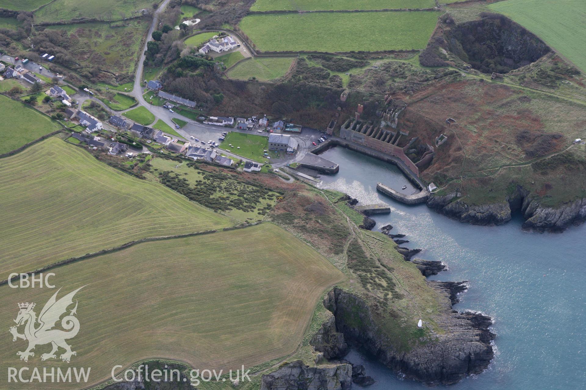 RCAHMW colour oblique photograph of Porthgain Harbour and Brickworks. Taken by Toby Driver on 16/11/2010.