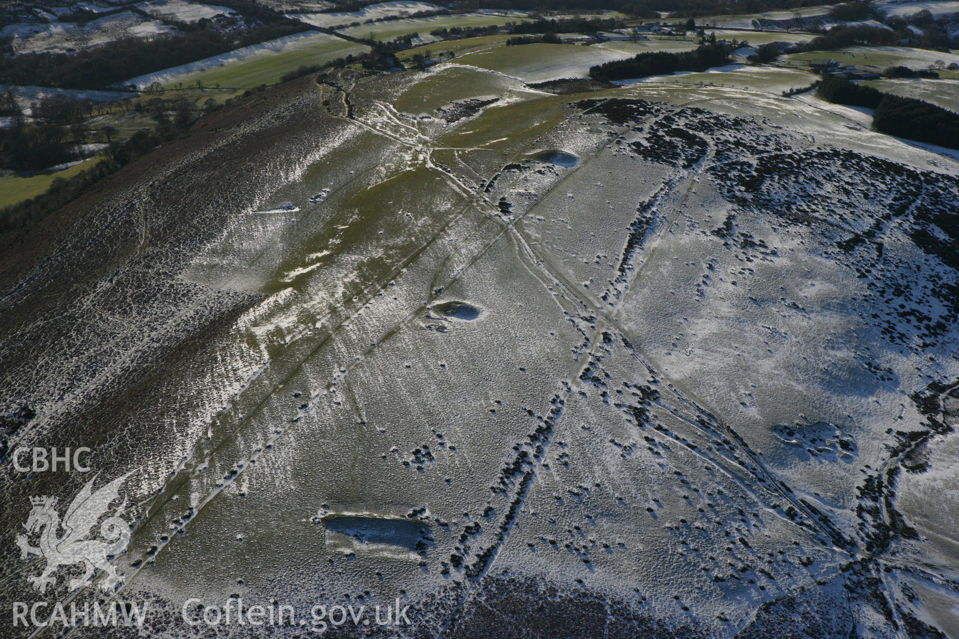 RCAHMW colour oblique photograph of Garth Hill barrows. Taken by Toby Driver on 08/12/2010.