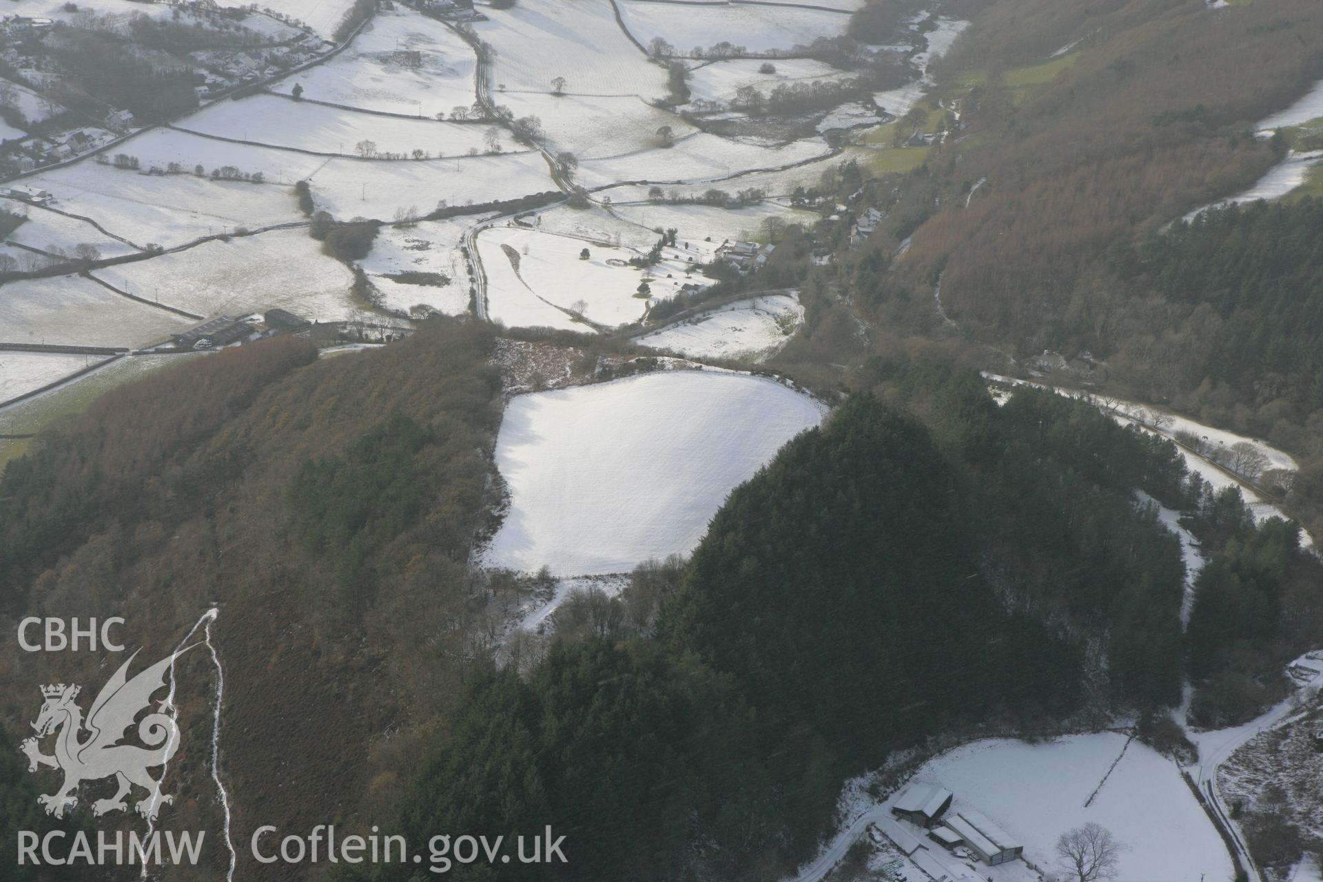 RCAHMW colour oblique photograph of Banc y Castell hillfort (Castell Goginan Fach). Taken by Toby Driver on 02/12/2010.