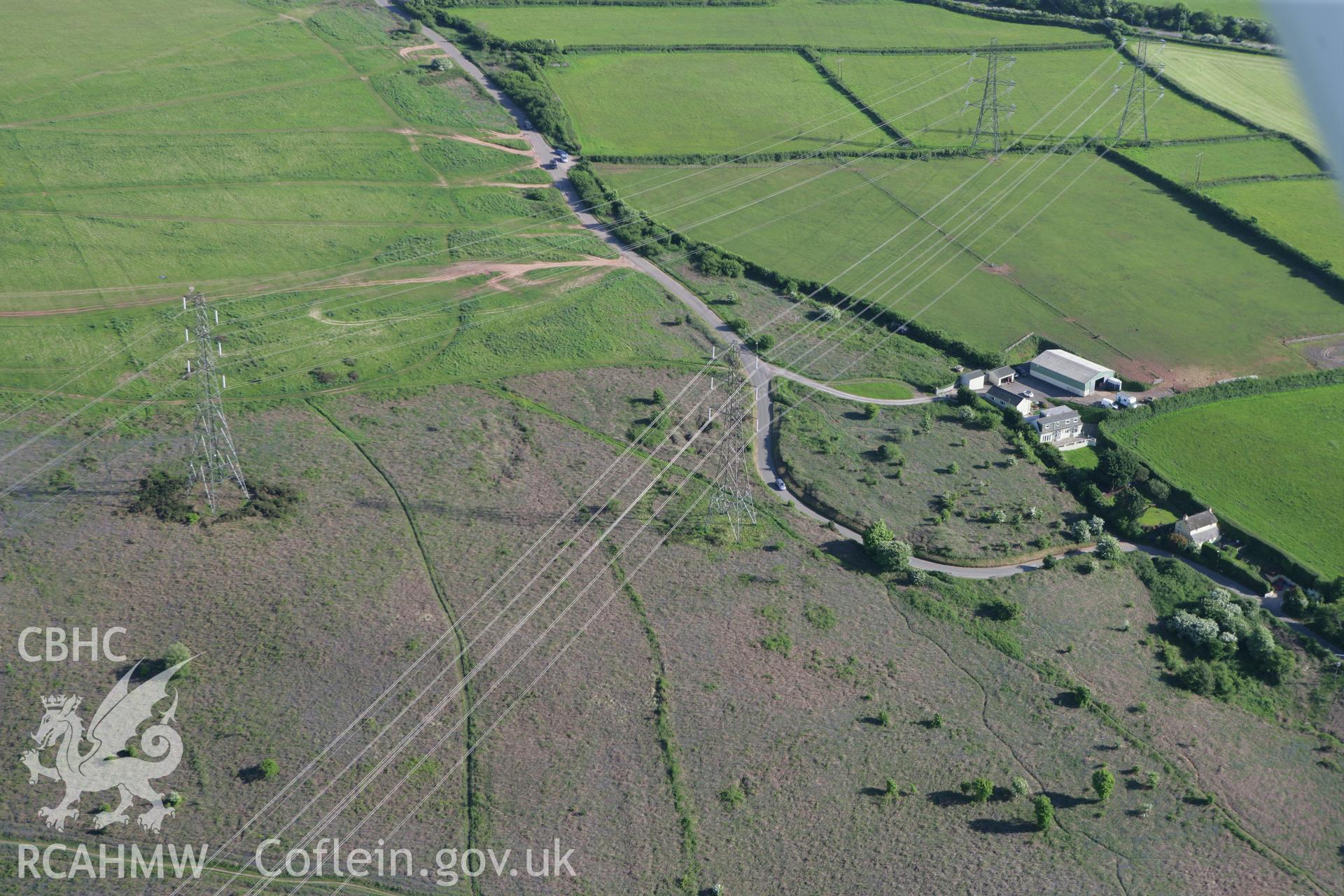 RCAHMW colour oblique photograph of Stalling Down, round barrow. Taken by Toby Driver on 24/05/2010.