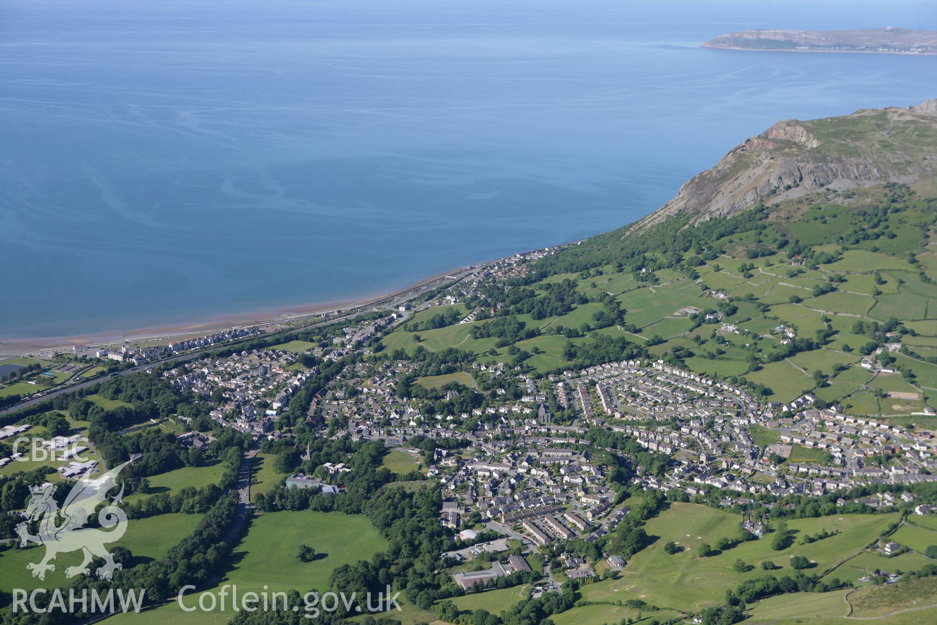 RCAHMW colour oblique photograph of Llanfairfechan, from the south-west. Taken by Toby Driver on 16/06/2010.