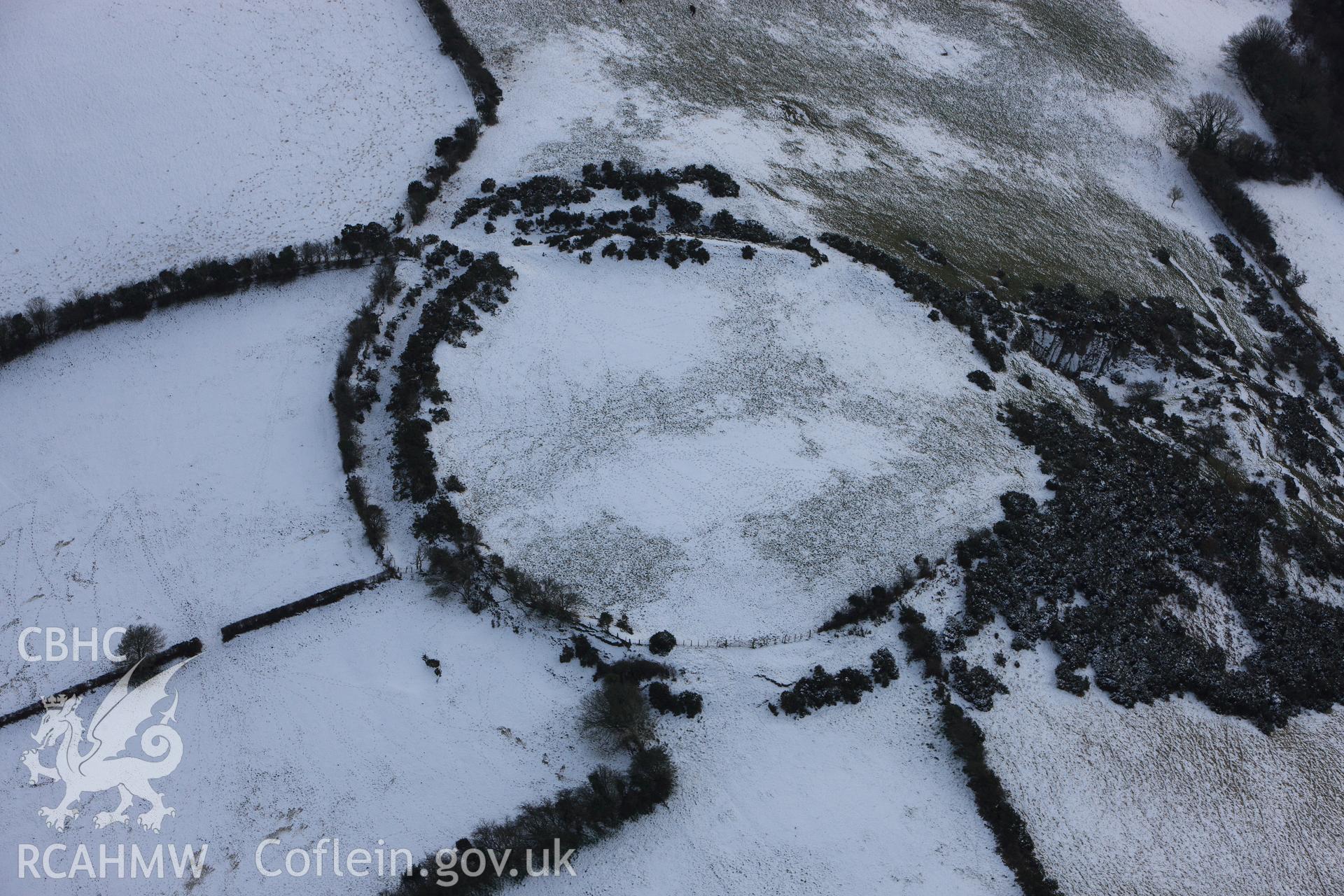 RCAHMW colour oblique photograph of Gaer Maesmynach hillfort (Cribyn Gaer). Taken by Toby Driver on 02/12/2010.