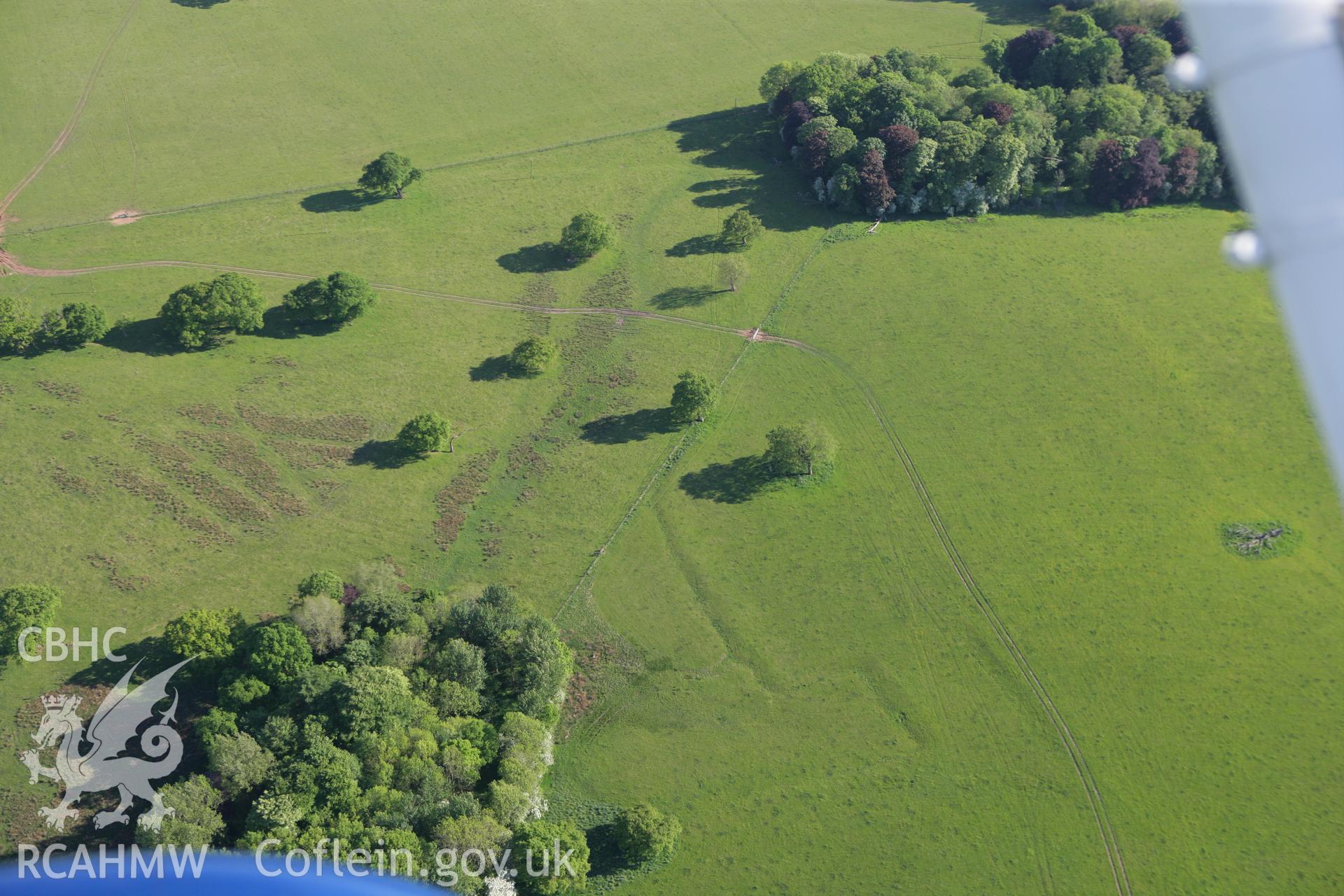 RCAHMW colour oblique photograph of Tregochas, earthworks of field systems. Taken by Toby Driver on 24/05/2010.