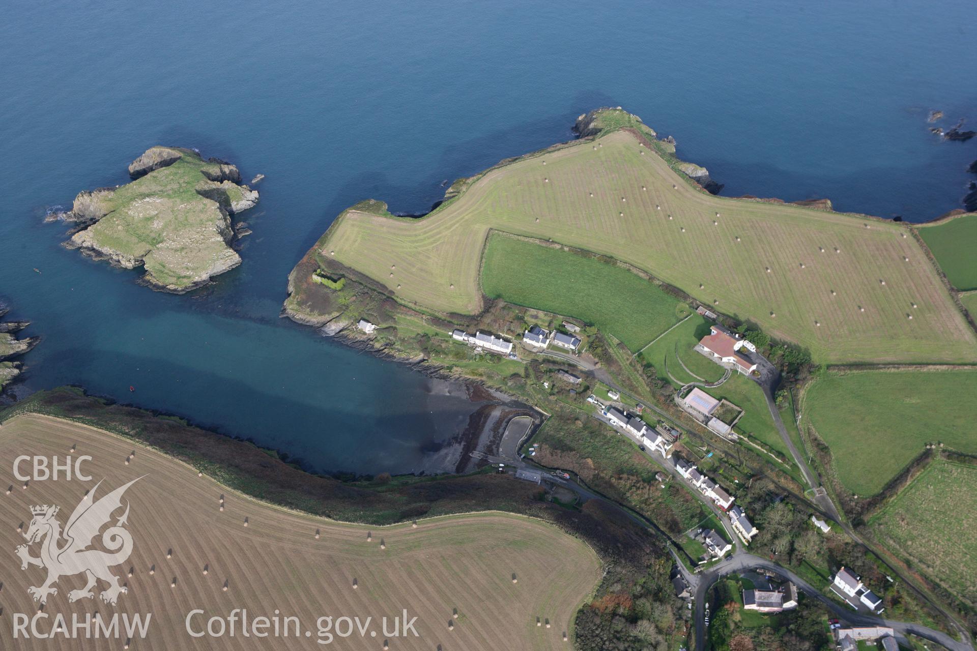 RCAHMW colour oblique photograph of Ynys-y-Castell Promontory Fort, with Abercastle (Abercastell) village. Taken by Toby Driver on 16/11/2010.