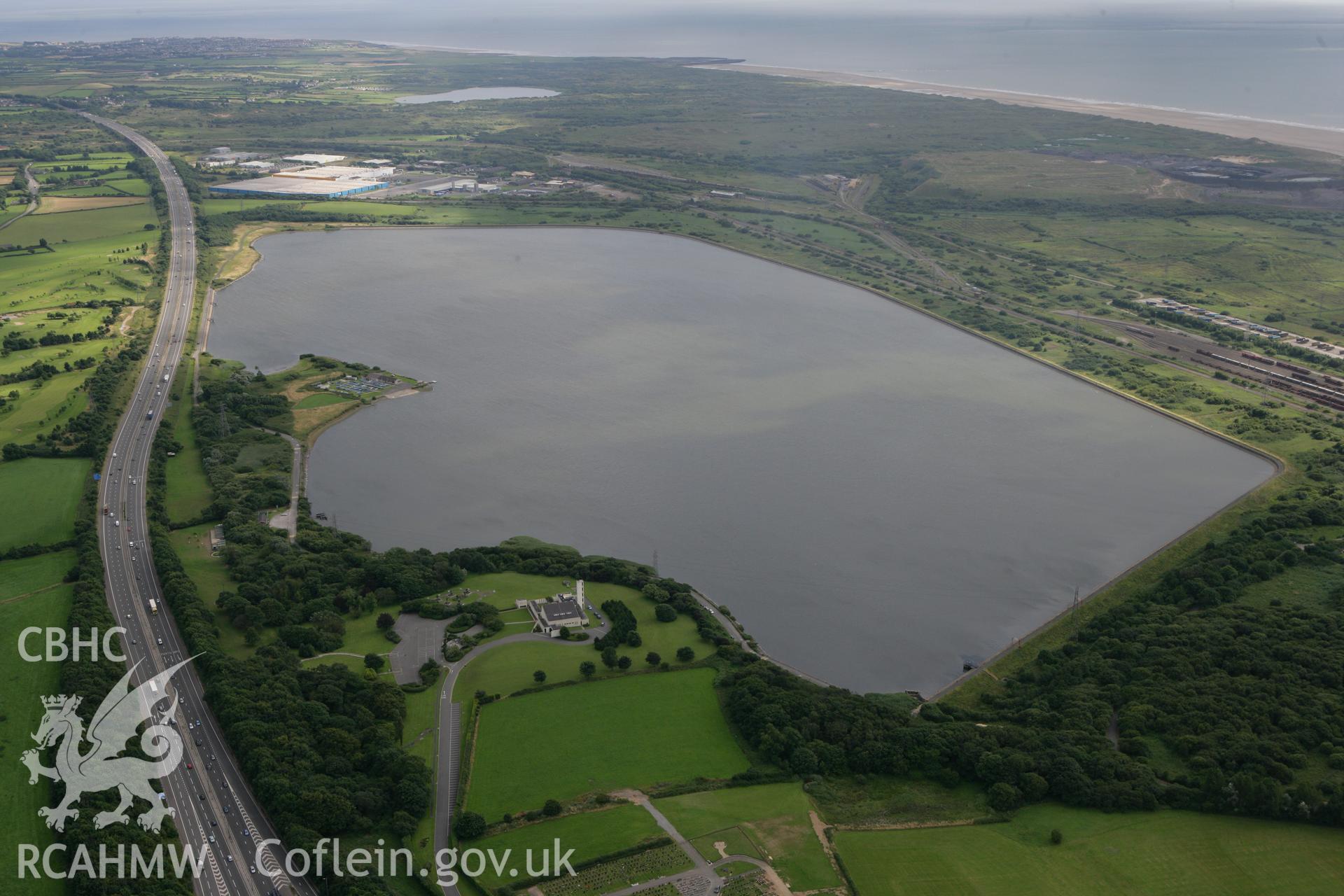 RCAHMW colour oblique photograph of Eglwys Nunydd Reservoir, Margam. Taken by Toby Driver on 29/07/2010.