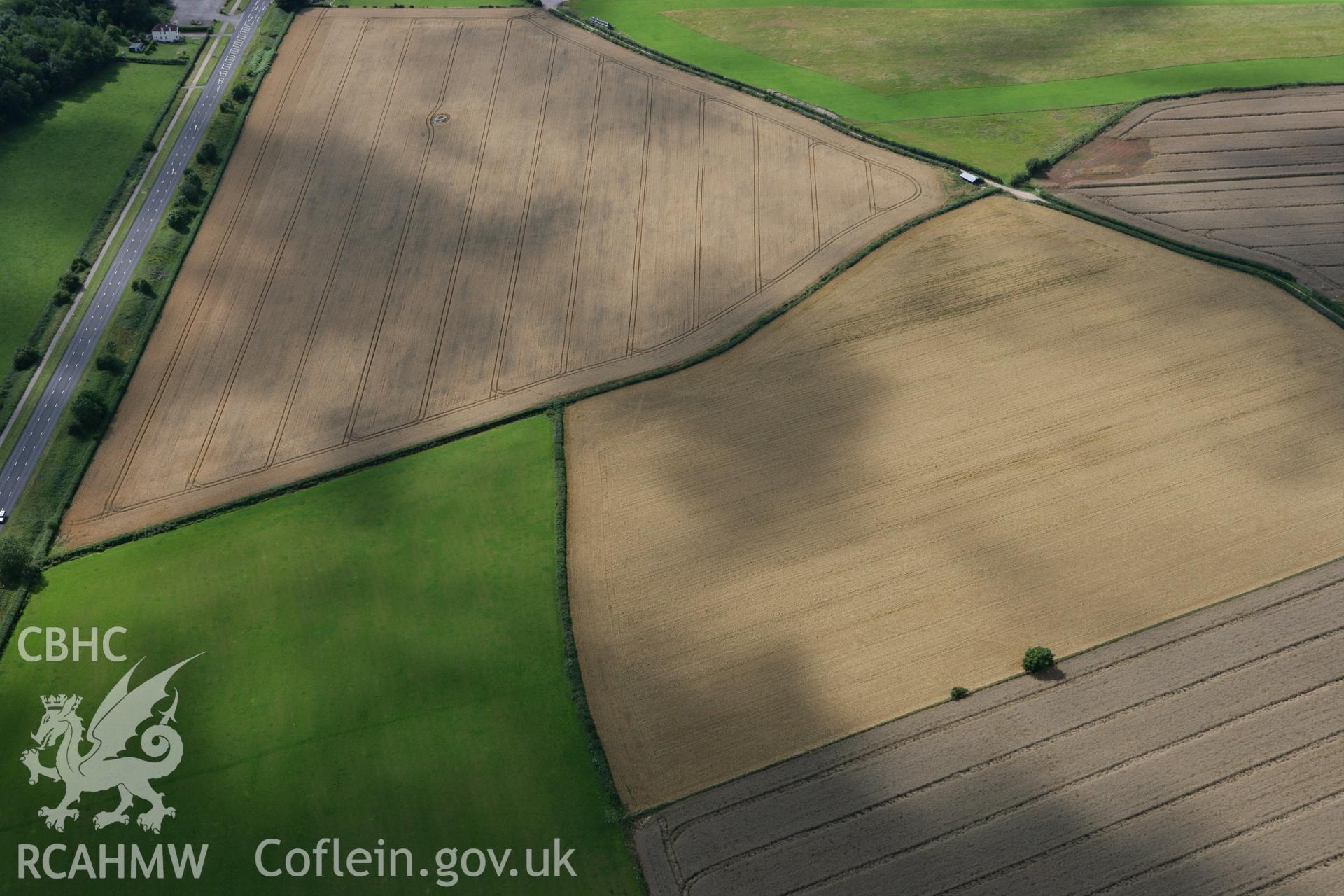 RCAHMW colour oblique photograph of Five Lanes Round Barrow. Taken by Toby Driver on 29/07/2010.