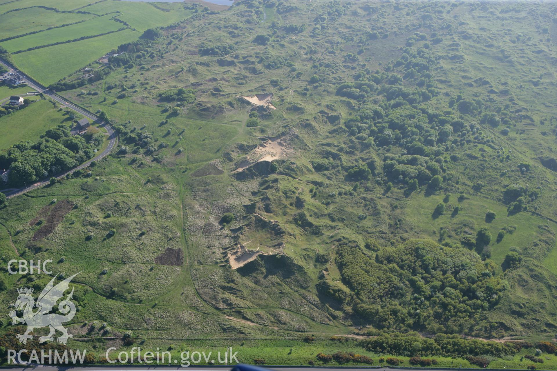 RCAHMW colour oblique photograph of Kenfig Medieval Borough. Taken by Toby Driver on 24/05/2010.