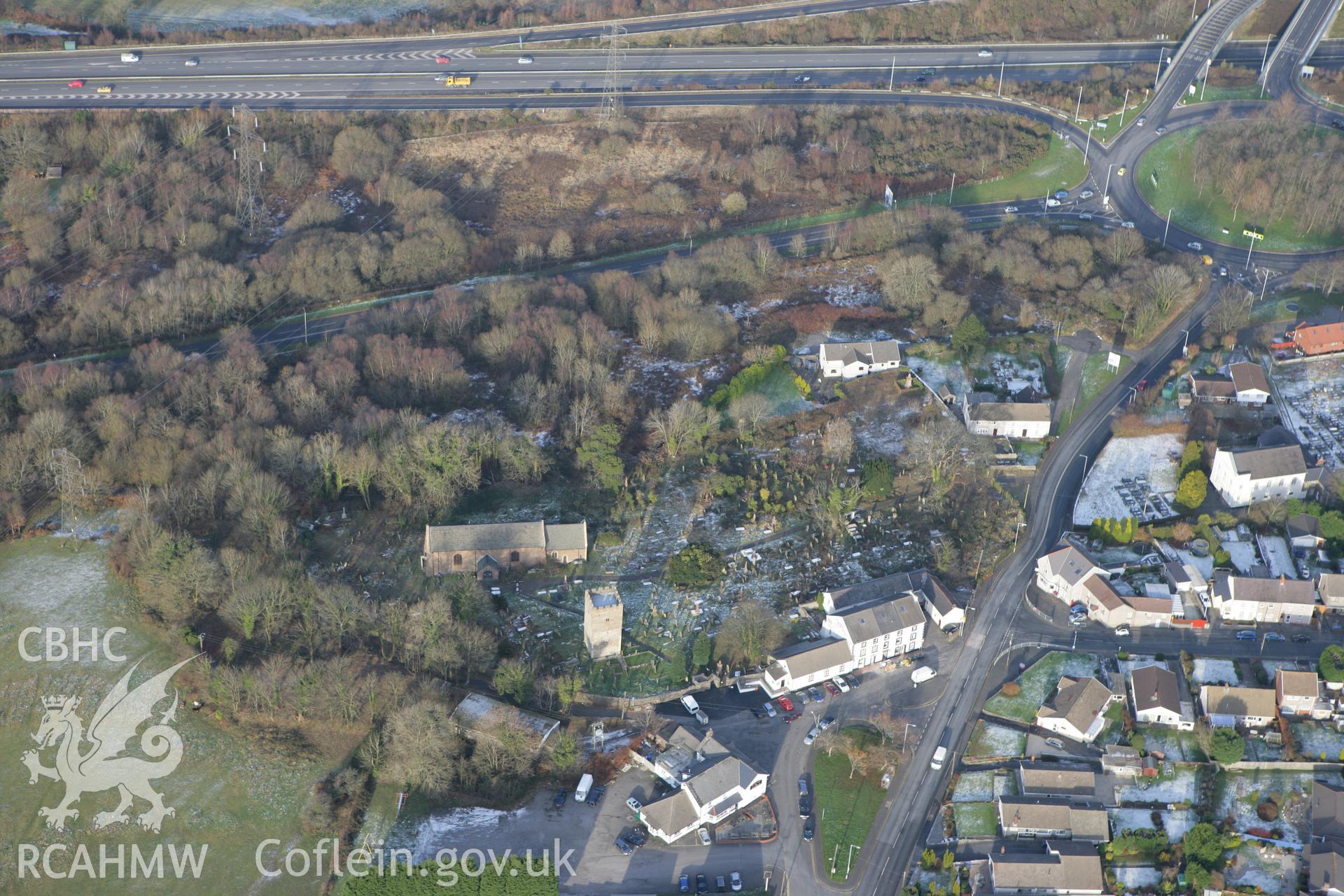 RCAHMW colour oblique photograph of Llangyfelach, view from the south, showing St David and St Cyfelach's church and tower. Taken by Toby Driver on 01/12/2010.