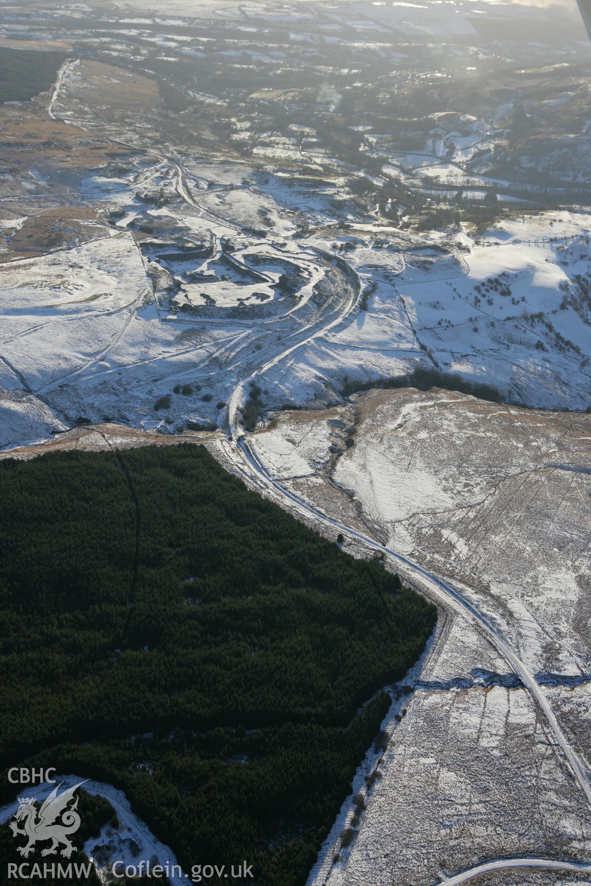 RCAHMW colour oblique photograph of Twyn Disgwylfa quarry, Penwyllt. Taken by Toby Driver on 08/12/2010.