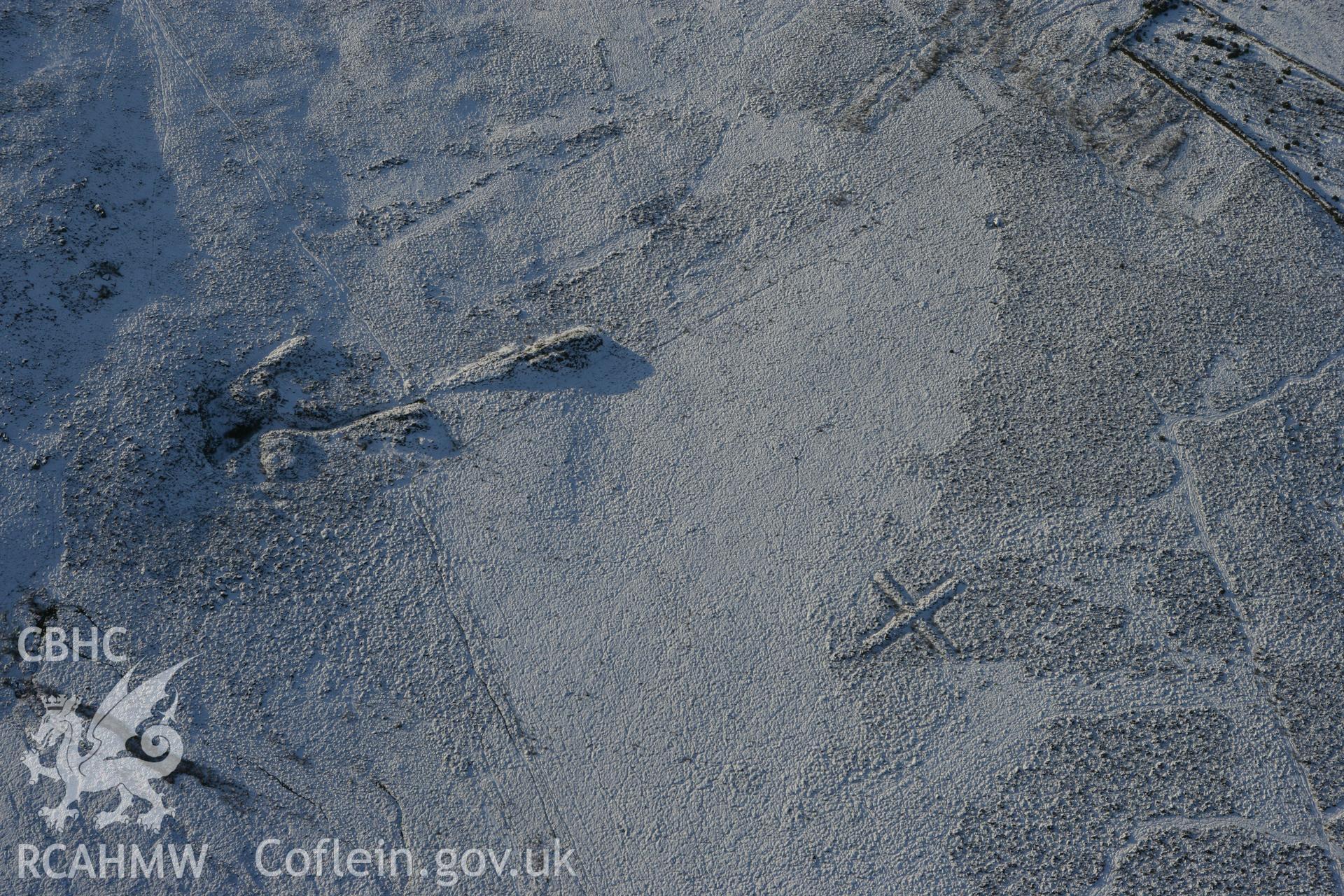 RCAHMW colour oblique photograph of Foel Drych with pillow mound. Taken by Toby Driver on 01/12/2010.