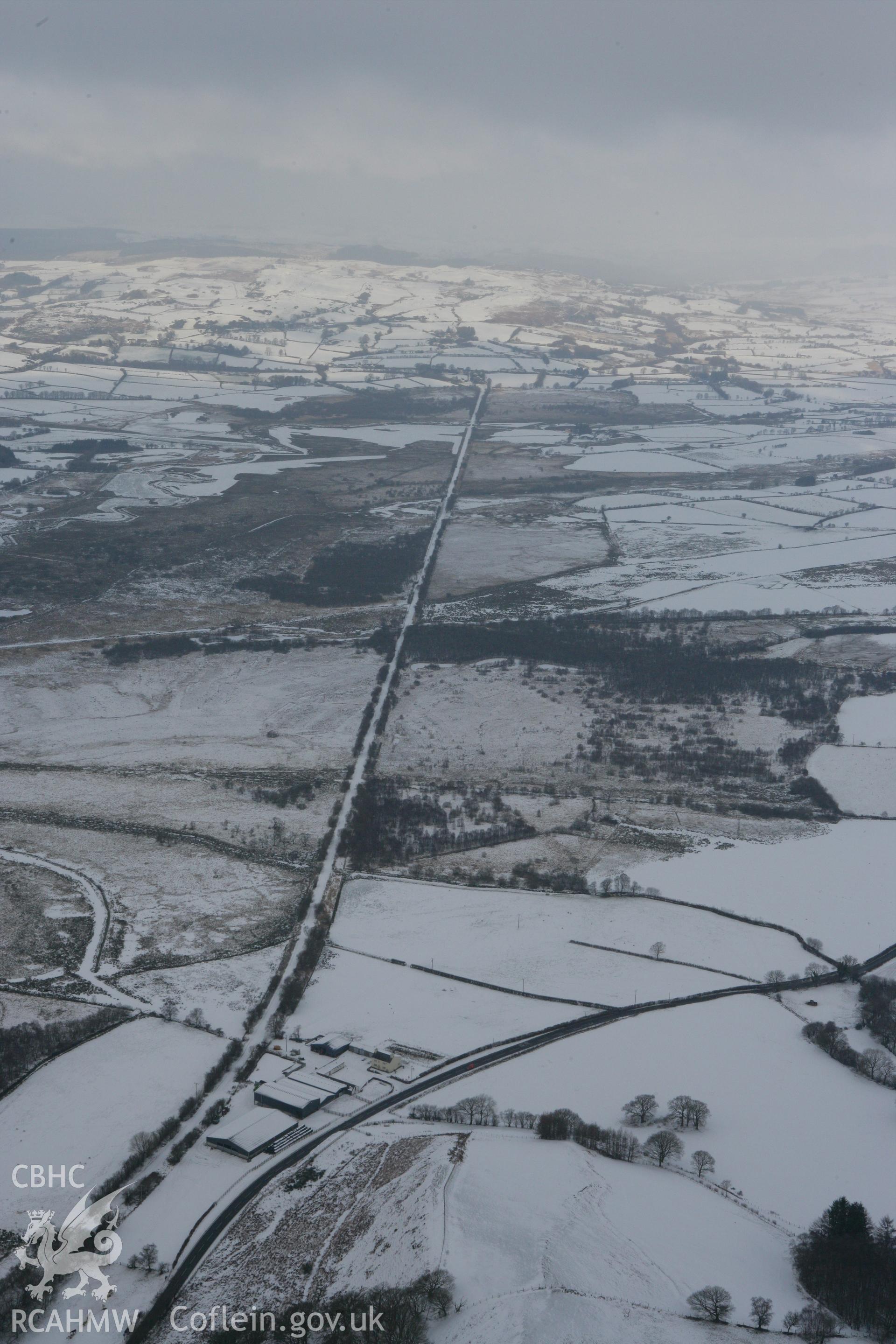 RCAHMW colour oblique photograph of Allt Ddu Railway Halt, Cors Caron, Tregaron Bog. Taken by Toby Driver on 02/12/2010.