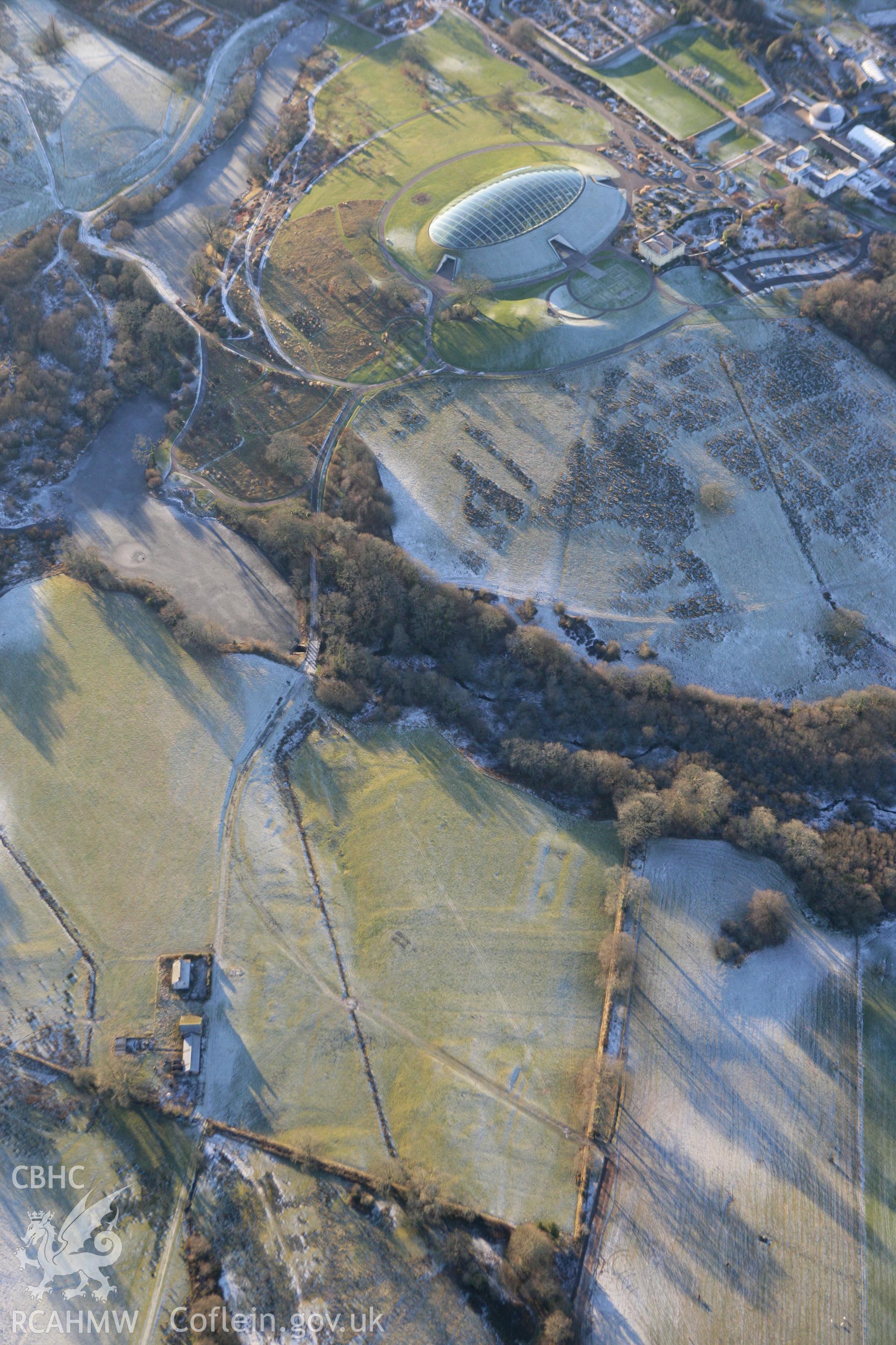 RCAHMW colour oblique photograph of Middleton Hall, showing earthworks at the site of the first mansion. Taken by Toby Driver on 08/12/2010.