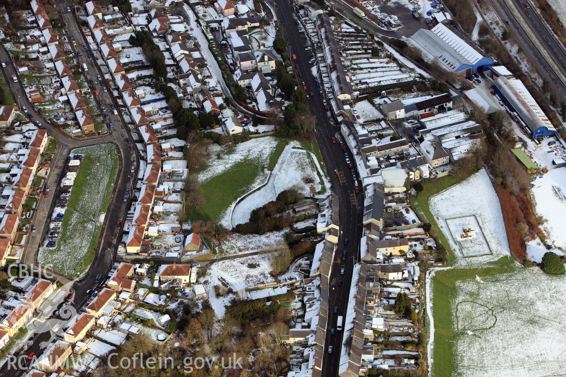 RCAHMW colour oblique aerial photograph of Carmarthen Roman Amphitheatre under snow, by Toby Driver, 01/12/2010.