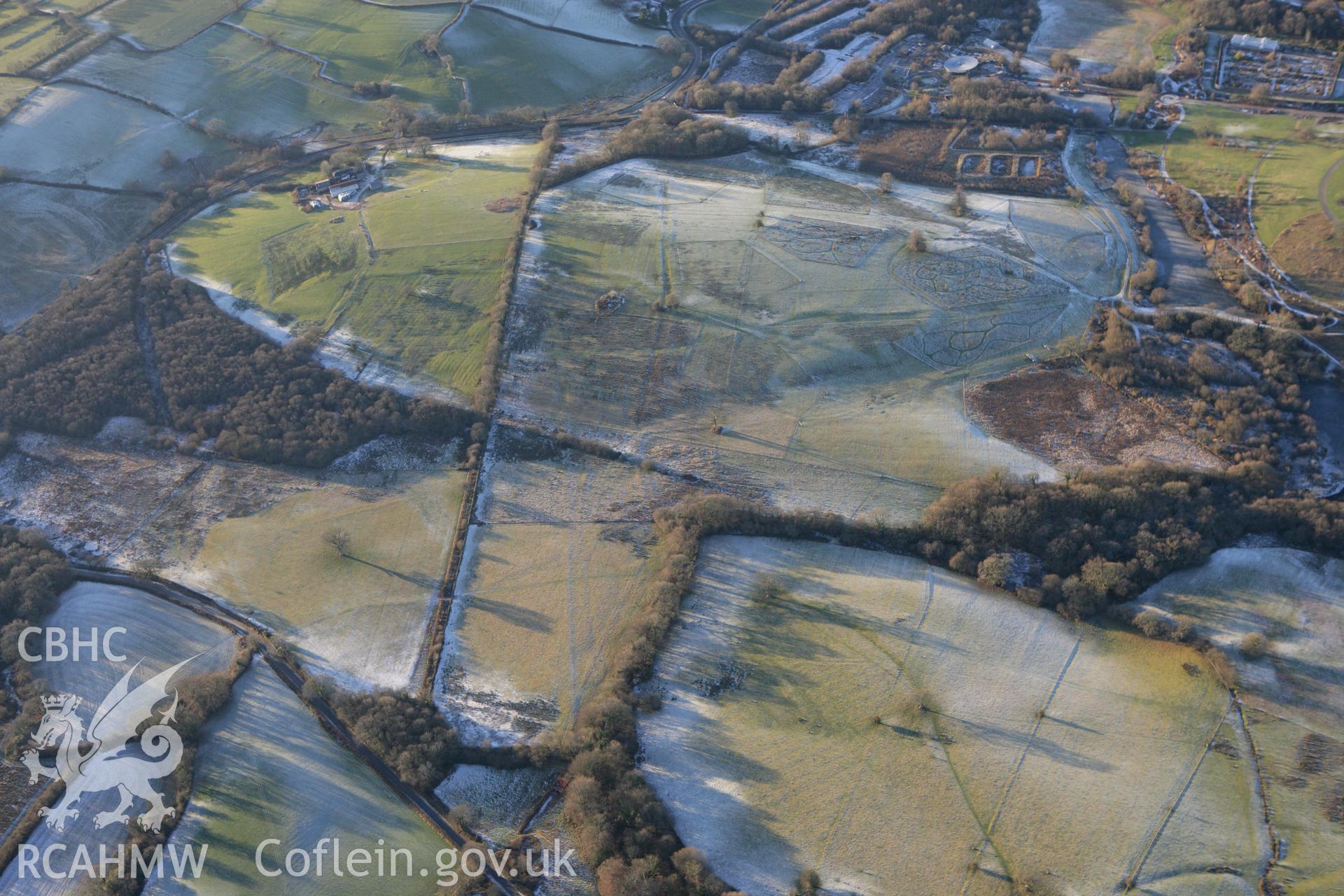 RCAHMW colour oblique photograph of earthworks features in Middleton Hall Park, north of Bryncrwys. Taken by Toby Driver on 08/12/2010.