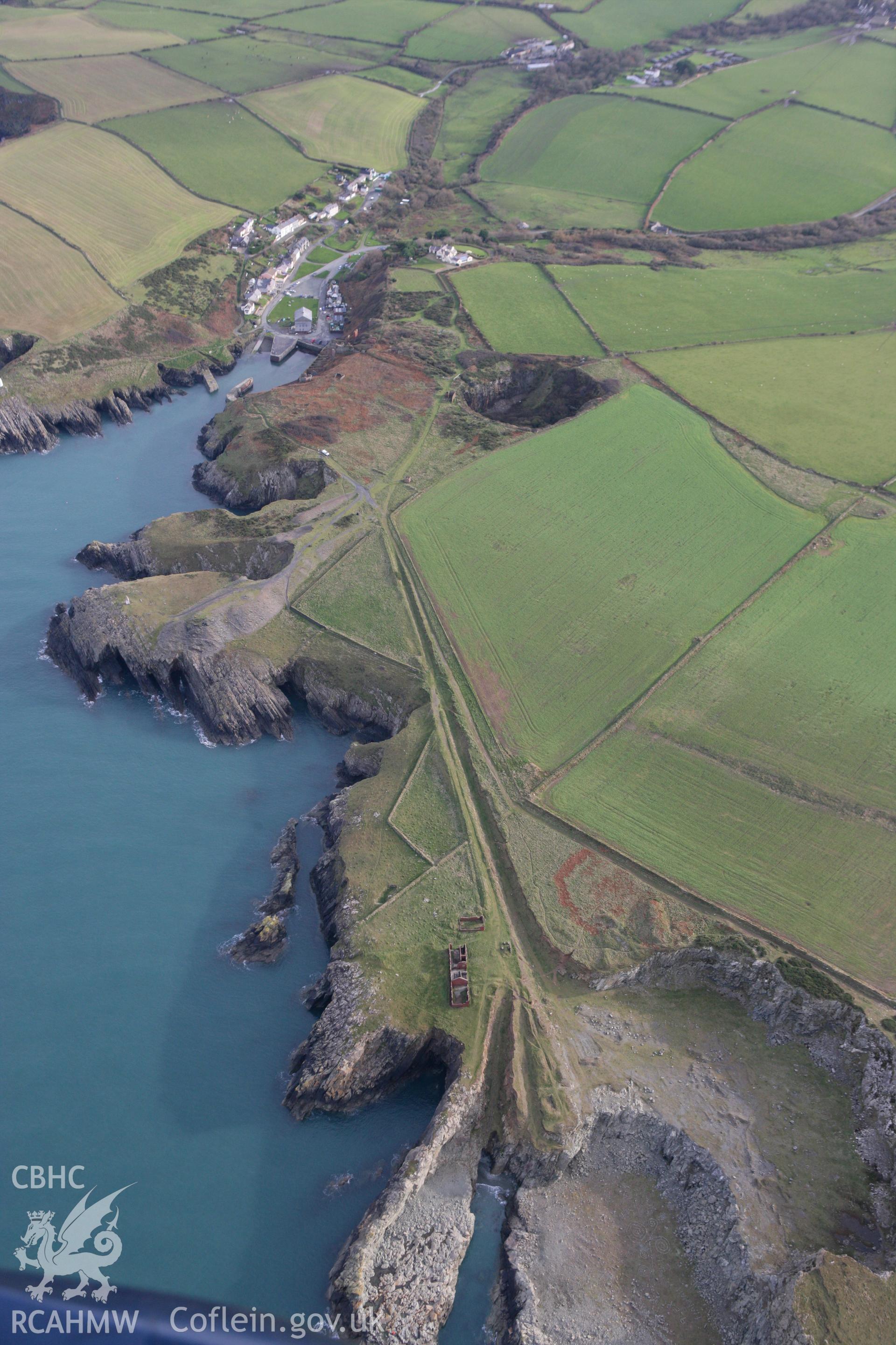 RCAHMW colour oblique photograph of Porthgain Quarries. Taken by Toby Driver on 16/11/2010.