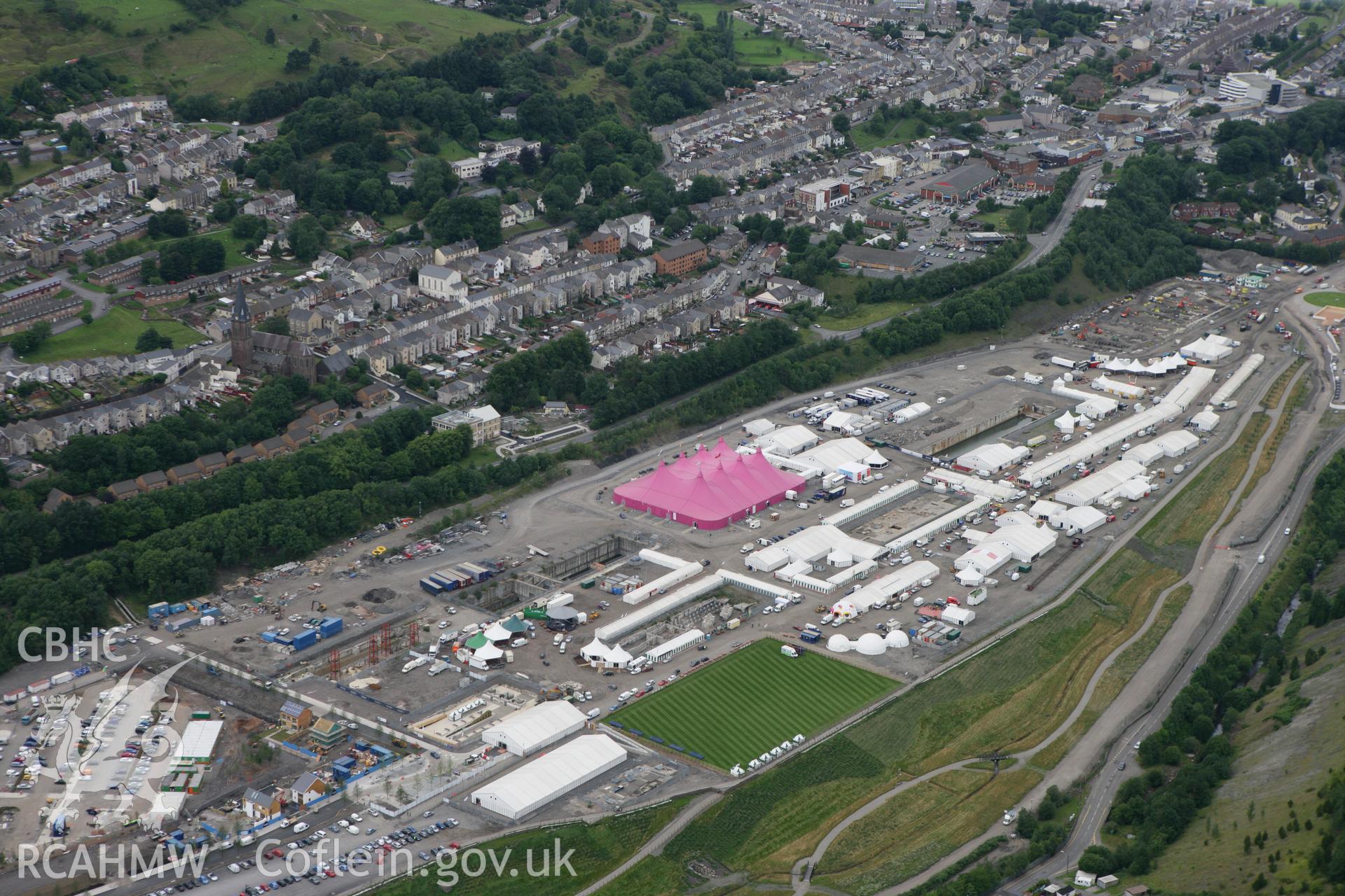 RCAHMW colour oblique photograph of National Eisteddfod of Wales 2010, on the site of the Ebbw Vale Steelworks. Taken by Toby Driver on 29/07/2010.