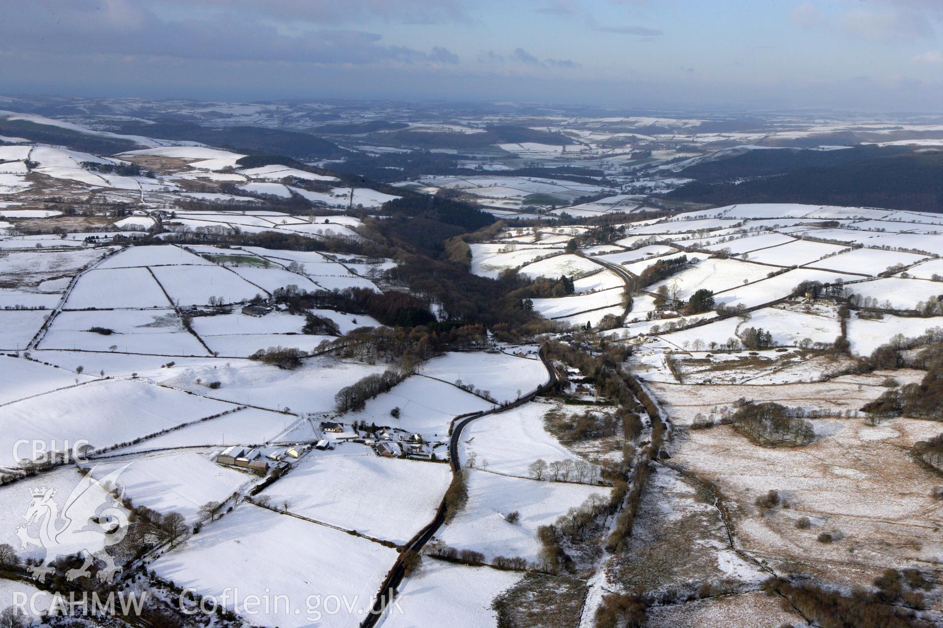 RCAHMW colour oblique photograph of Tynygraig village, from the south. Taken by Toby Driver on 02/12/2010.