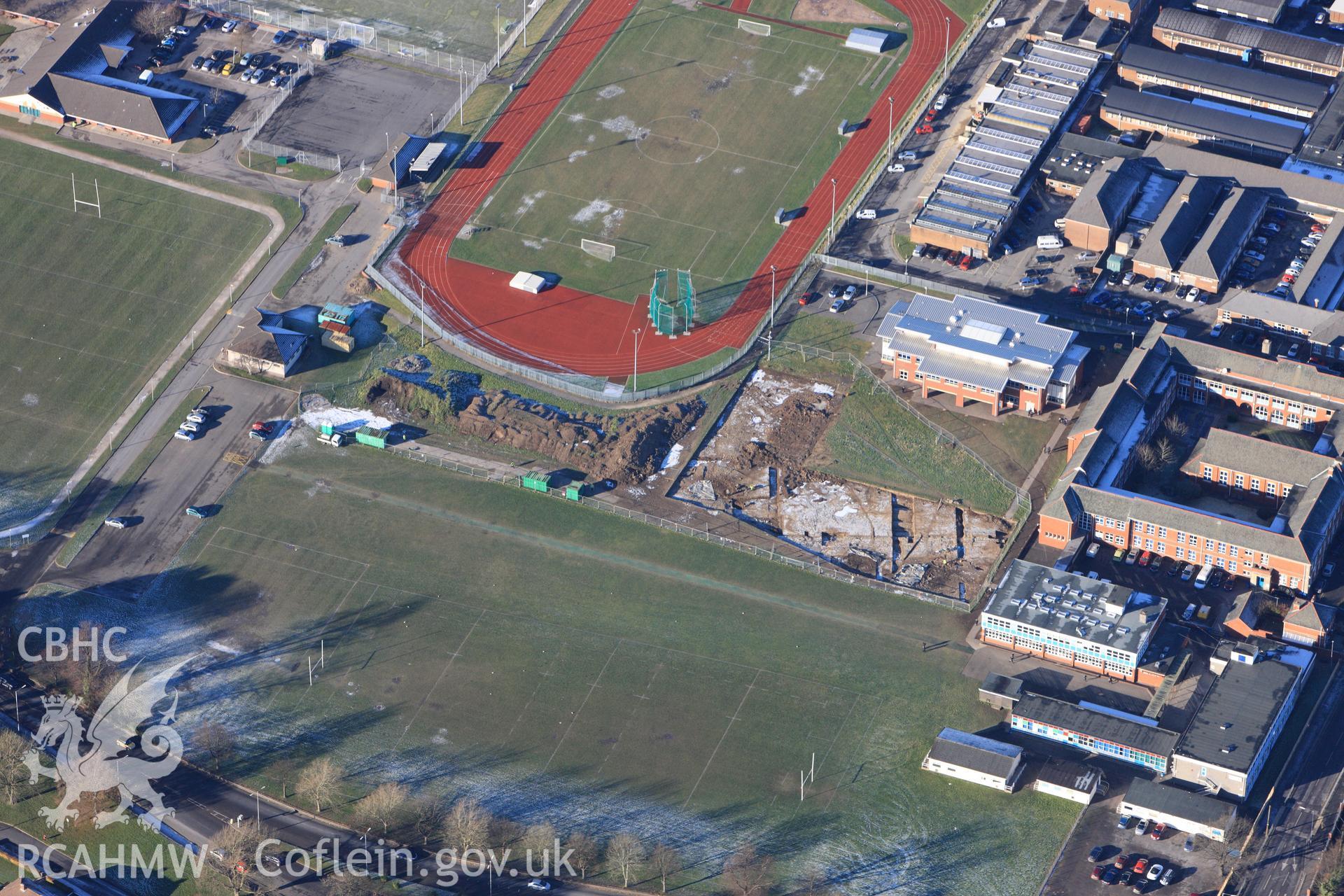 RCAHMW colour oblique photograph of Neath Auxiliary Fort, showing excavations. Taken by Toby Driver on 08/12/2010.