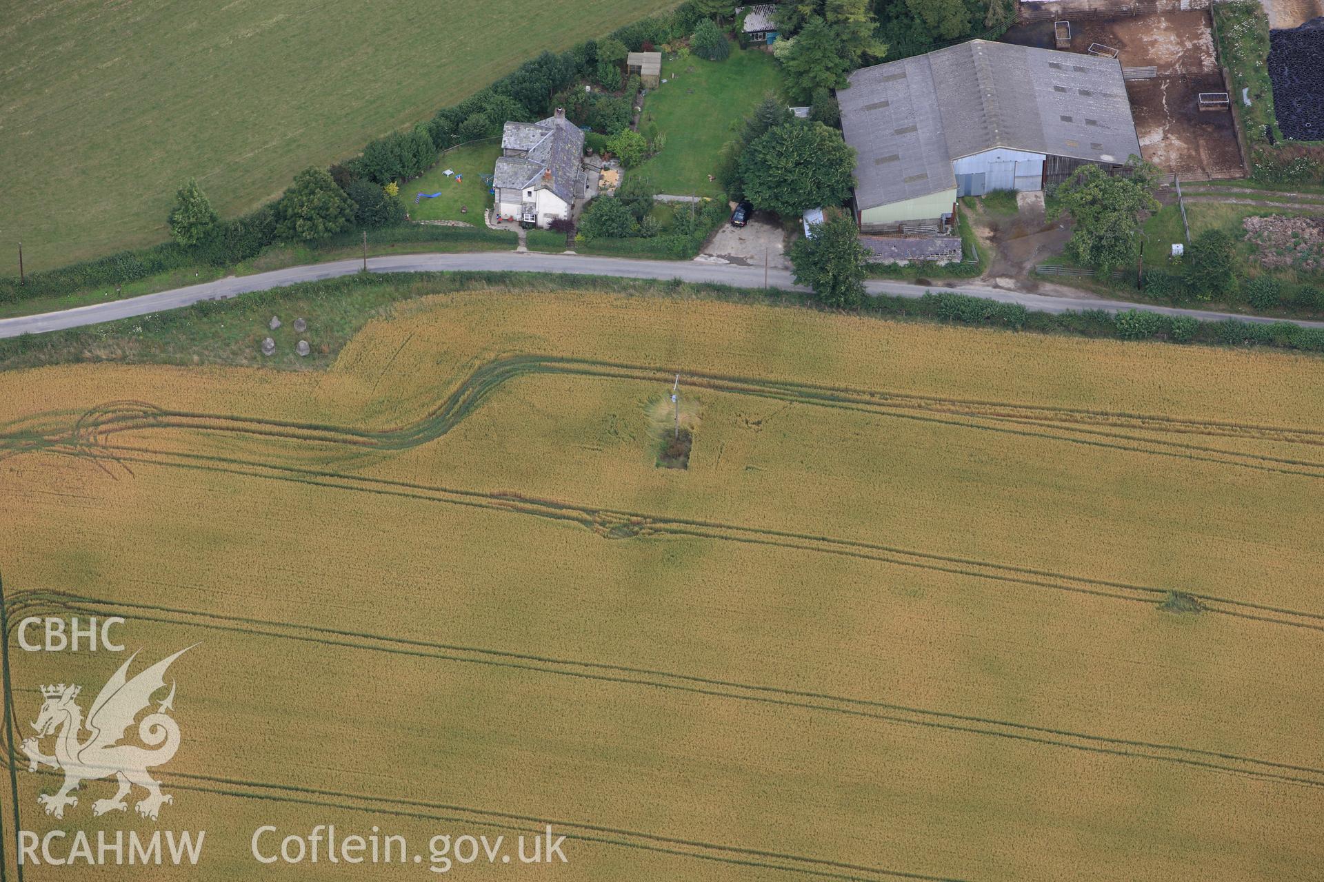 RCAHMW colour oblique photograph of Four Stones, standing stones. Taken by Toby Driver on 21/07/2010.