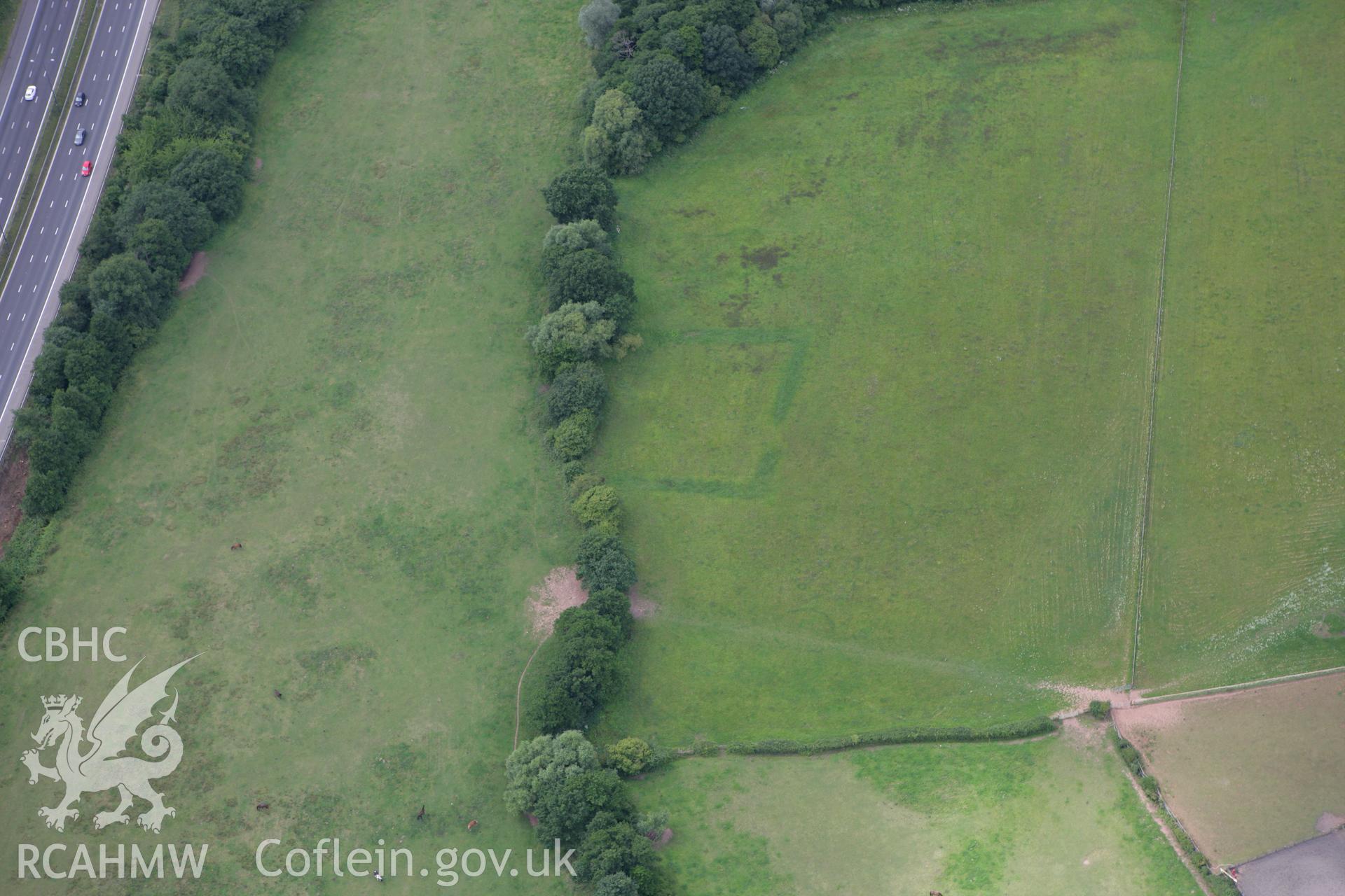 RCAHMW colour oblique photograph of Court Farm Moat. Taken by Toby Driver on 29/07/2010.
