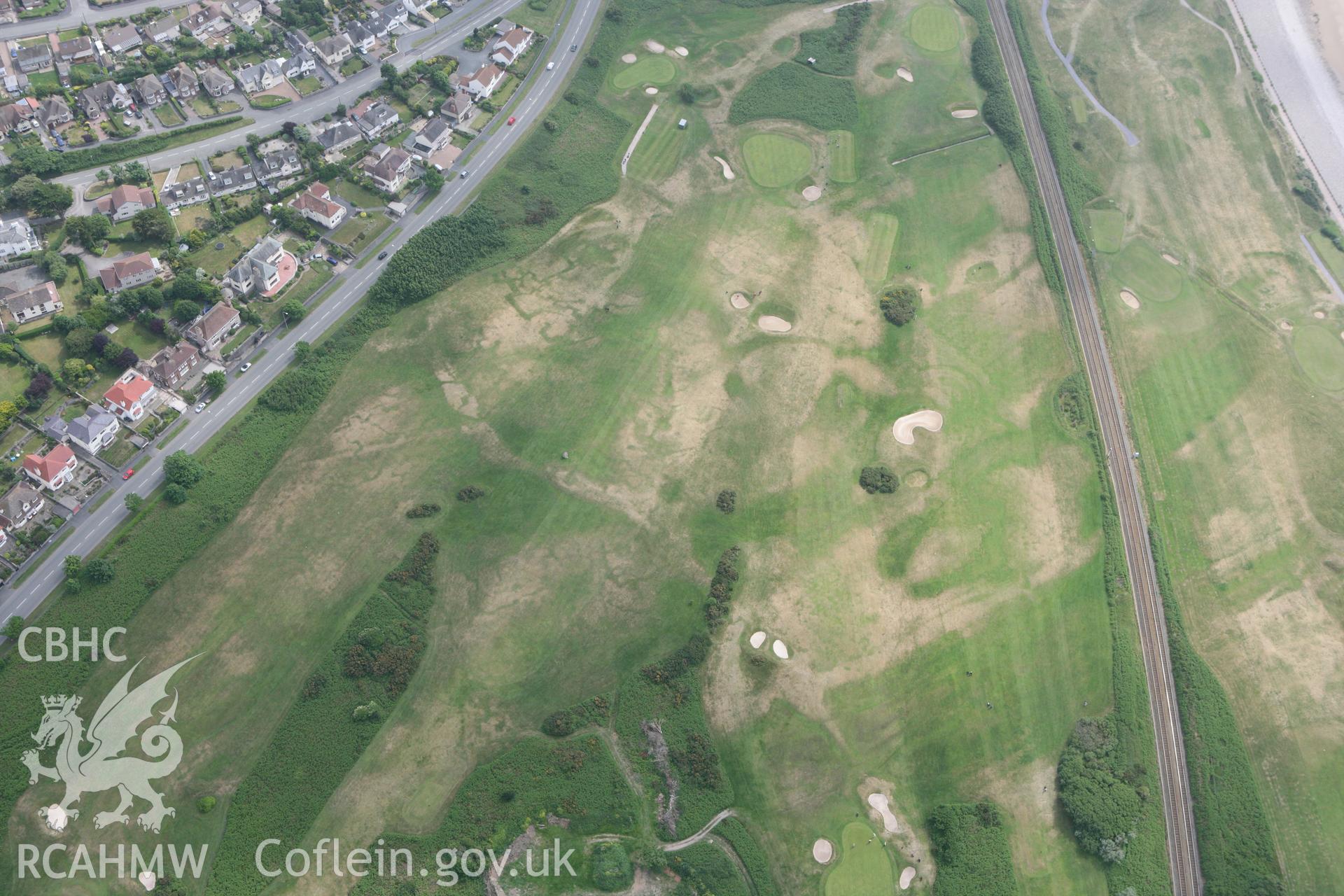 RCAHMW colour oblique photograph of Maesdu Golf course practice trenches. Taken by Toby Driver on 10/06/2010.