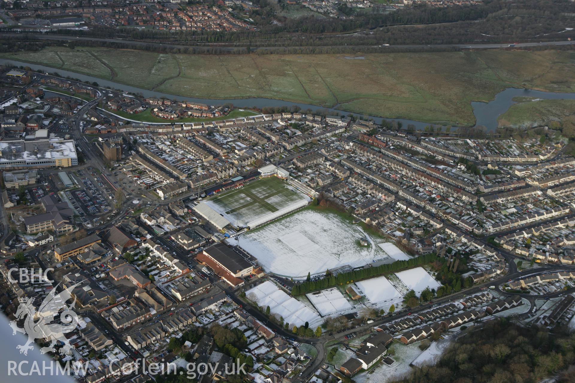 RCAHMW colour oblique photograph of Neath townscape, with The Gnoll cricket grounds. Taken by Toby Driver on 01/12/2010.