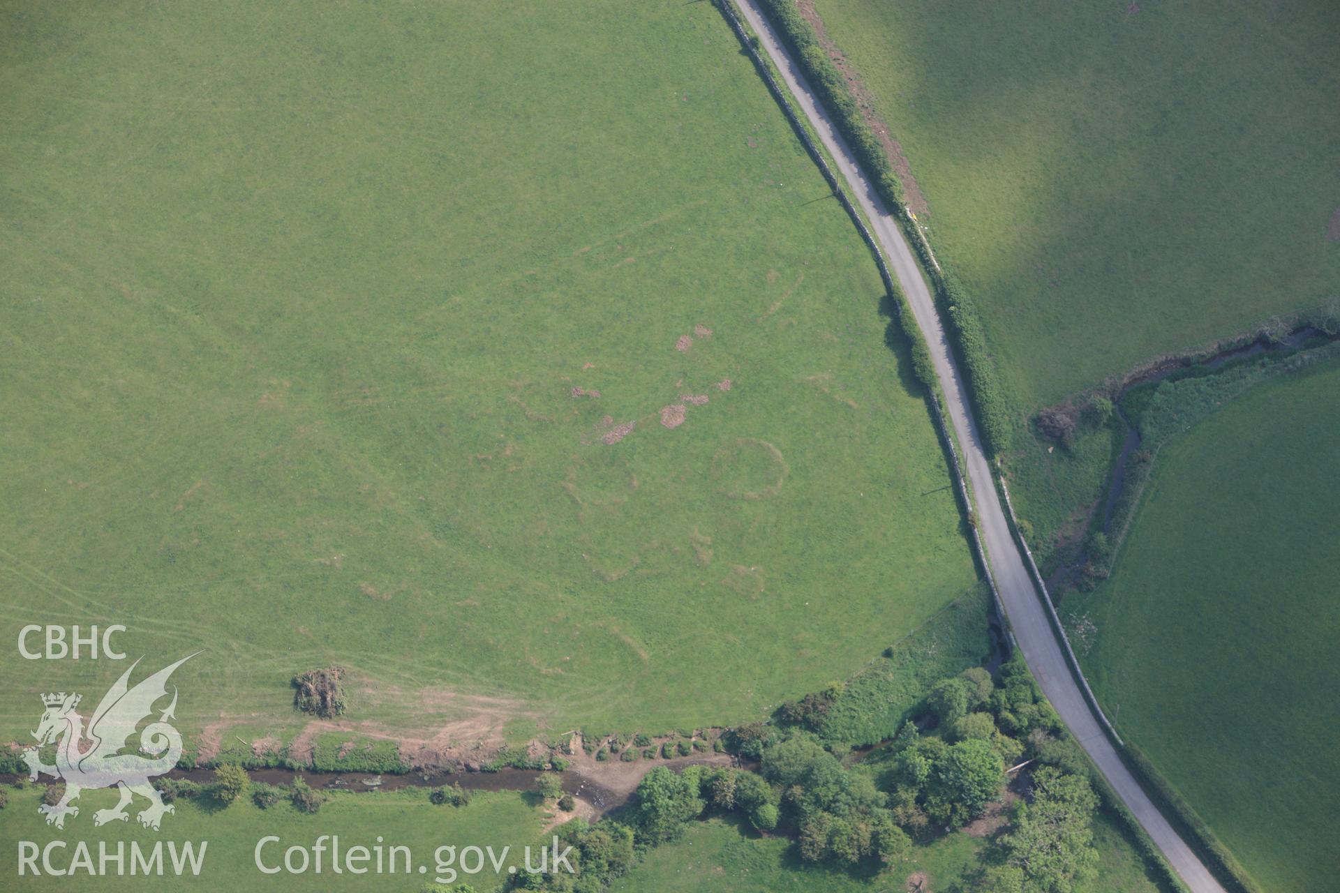 RCAHMW colour oblique photograph of Hut circles to north,. Taken by Toby Driver on 10/06/2010.