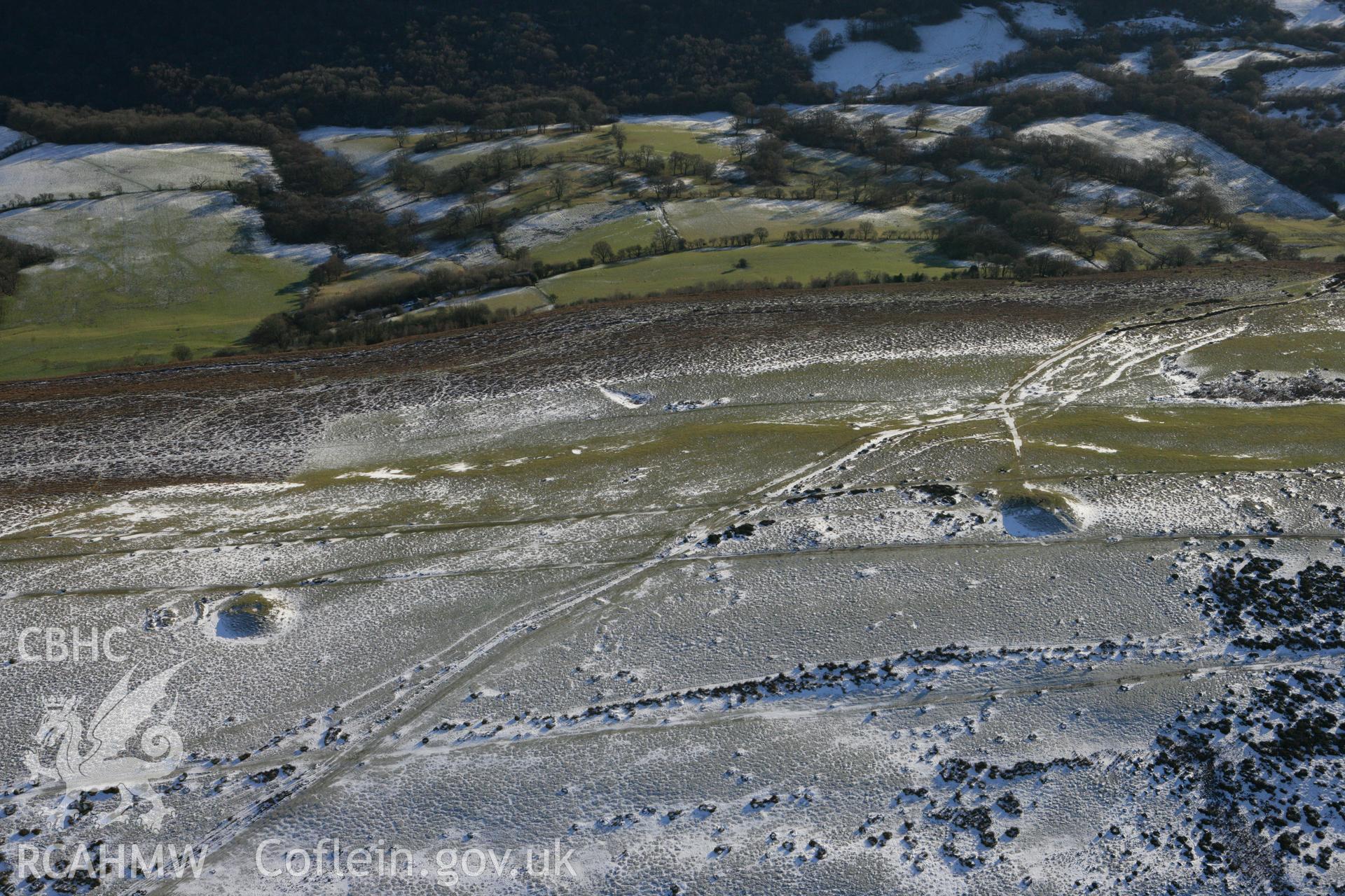 RCAHMW colour oblique photograph of Garth Hill barrows. Taken by Toby Driver on 08/12/2010.