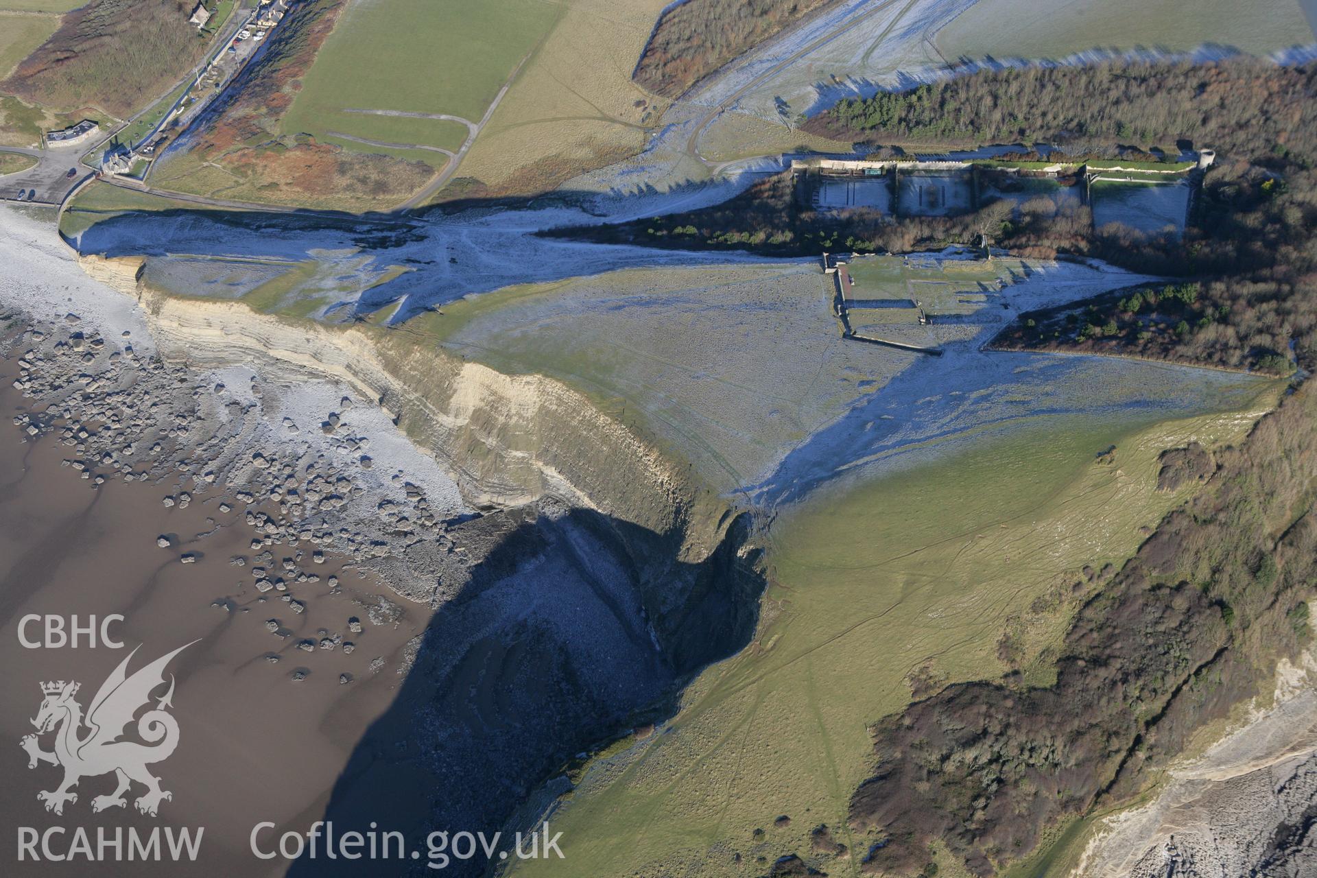 RCAHMW colour oblique photograph of Dunraven Hillfort, and south Glamorgan coast. Taken by Toby Driver on 08/12/2010.