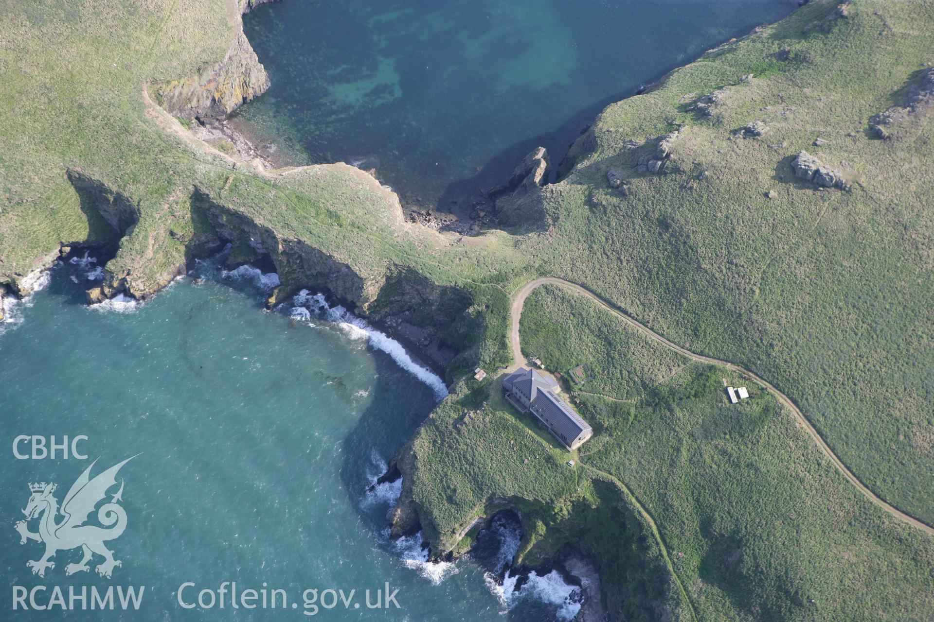 RCAHMW colour oblique photograph of South Castle, Skomer Island, The Neck promontory fort,. Taken by Toby Driver on 25/05/2010.