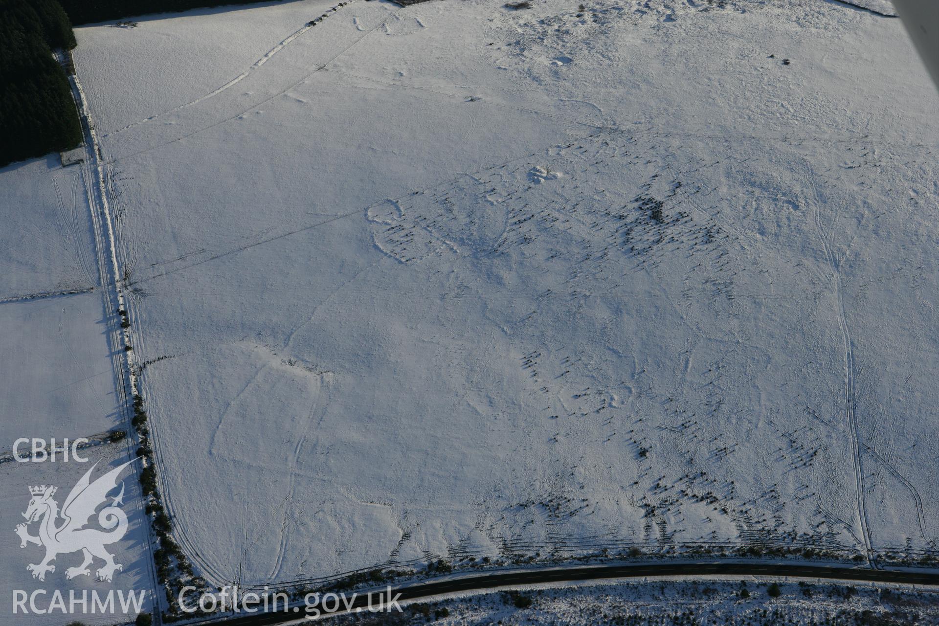 RCAHMW colour oblique photograph of Bernard's Well Mountain, prehistoric settlement, view from the north-west. Taken by Toby Driver on 01/12/2010.