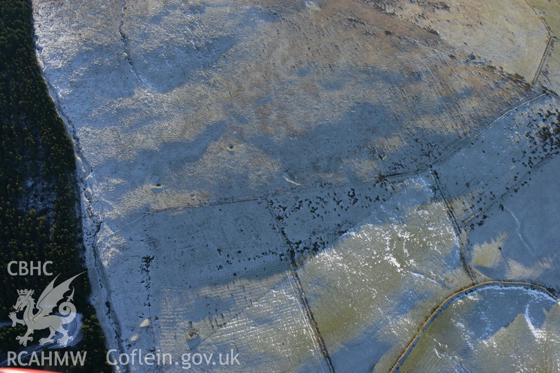 RCAHMW colour oblique photograph of Foel Fynyddau, settlement remains. Taken by Toby Driver on 08/12/2010.