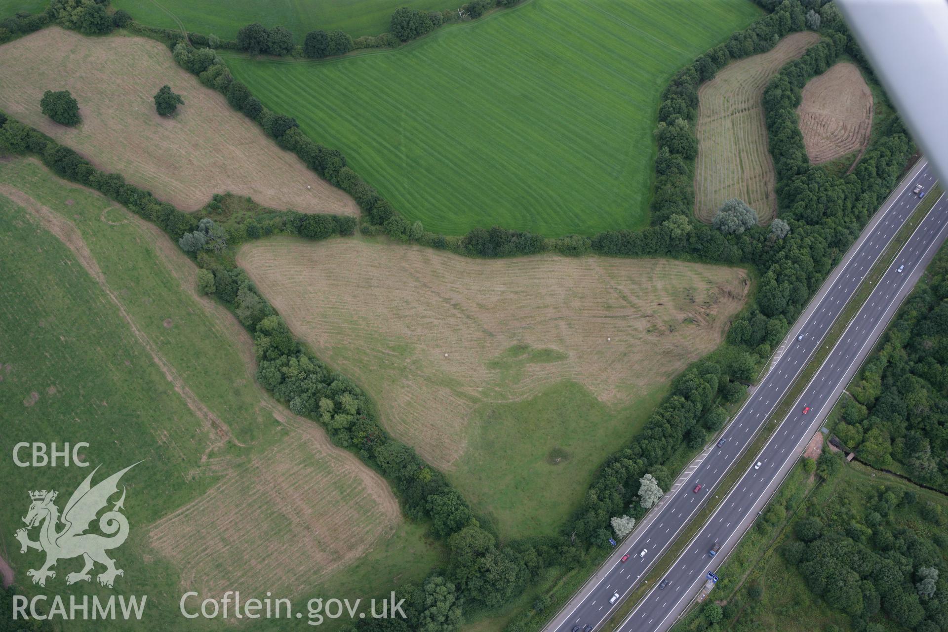RCAHMW colour oblique photograph of Ford Farm Roman Villa, Langstone. Taken by Toby Driver on 29/07/2010.