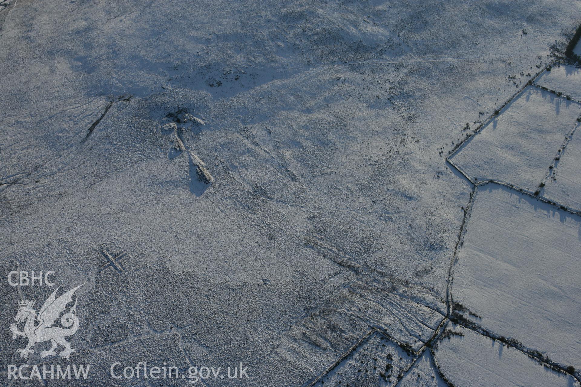 RCAHMW colour oblique photograph of Foel Drych with pillow mound. Taken by Toby Driver on 01/12/2010.