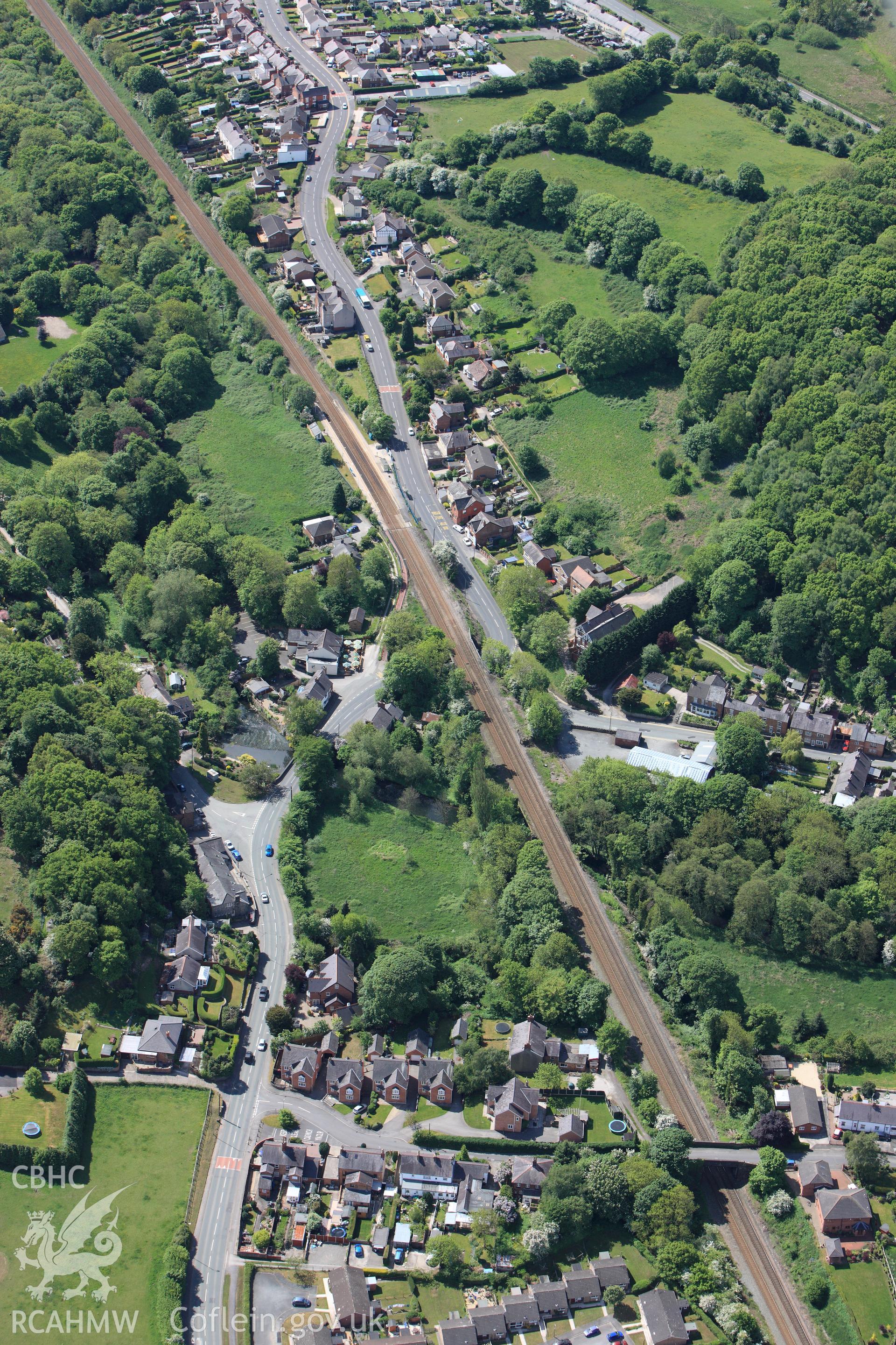 RCAHMW colour oblique photograph of Caergwrle town, from the north. Taken by Toby Driver on 27/05/2010.