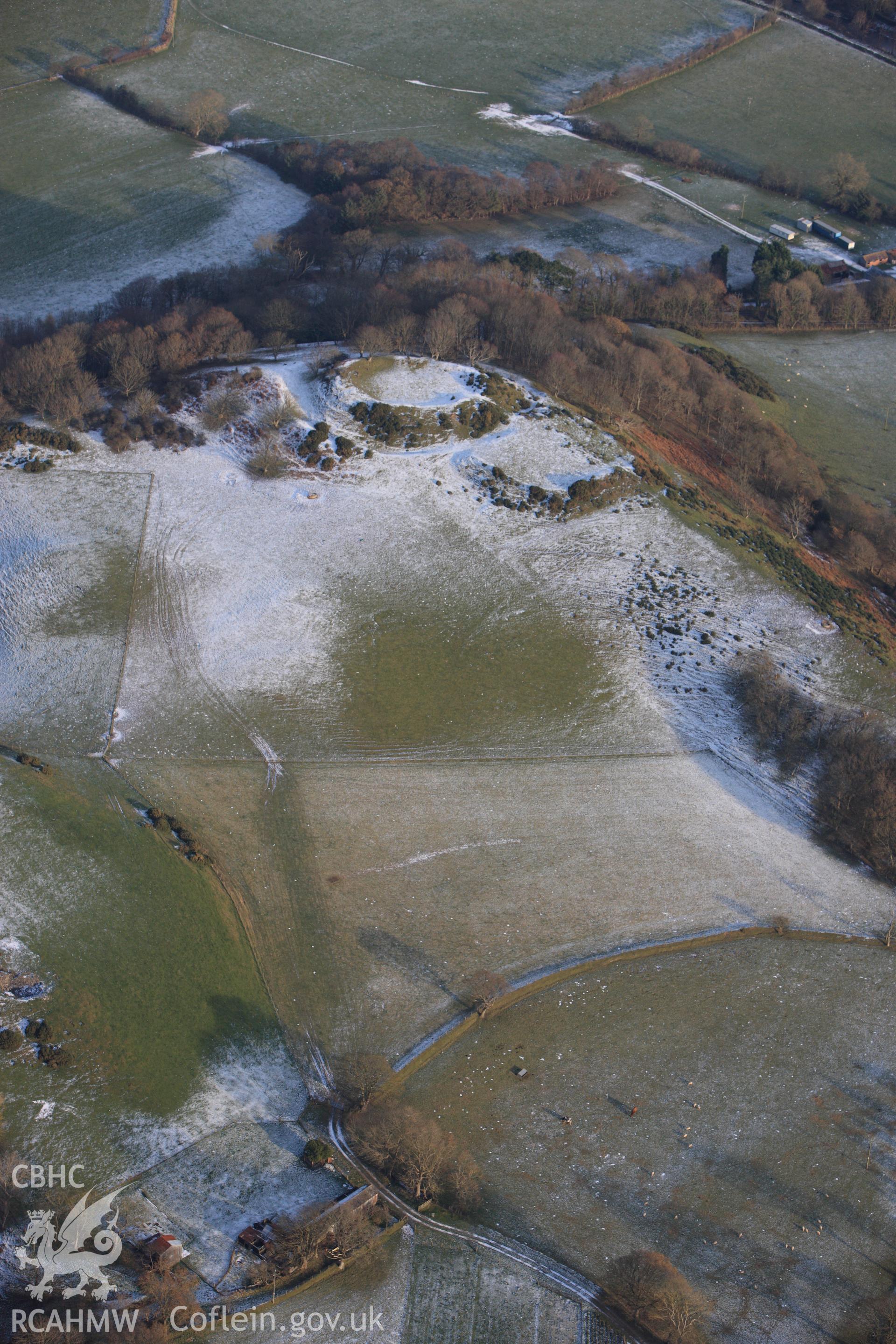 RCAHMW colour oblique photograph of Castell Tan y Castell, with snow. Taken by Toby Driver on 02/12/2010.