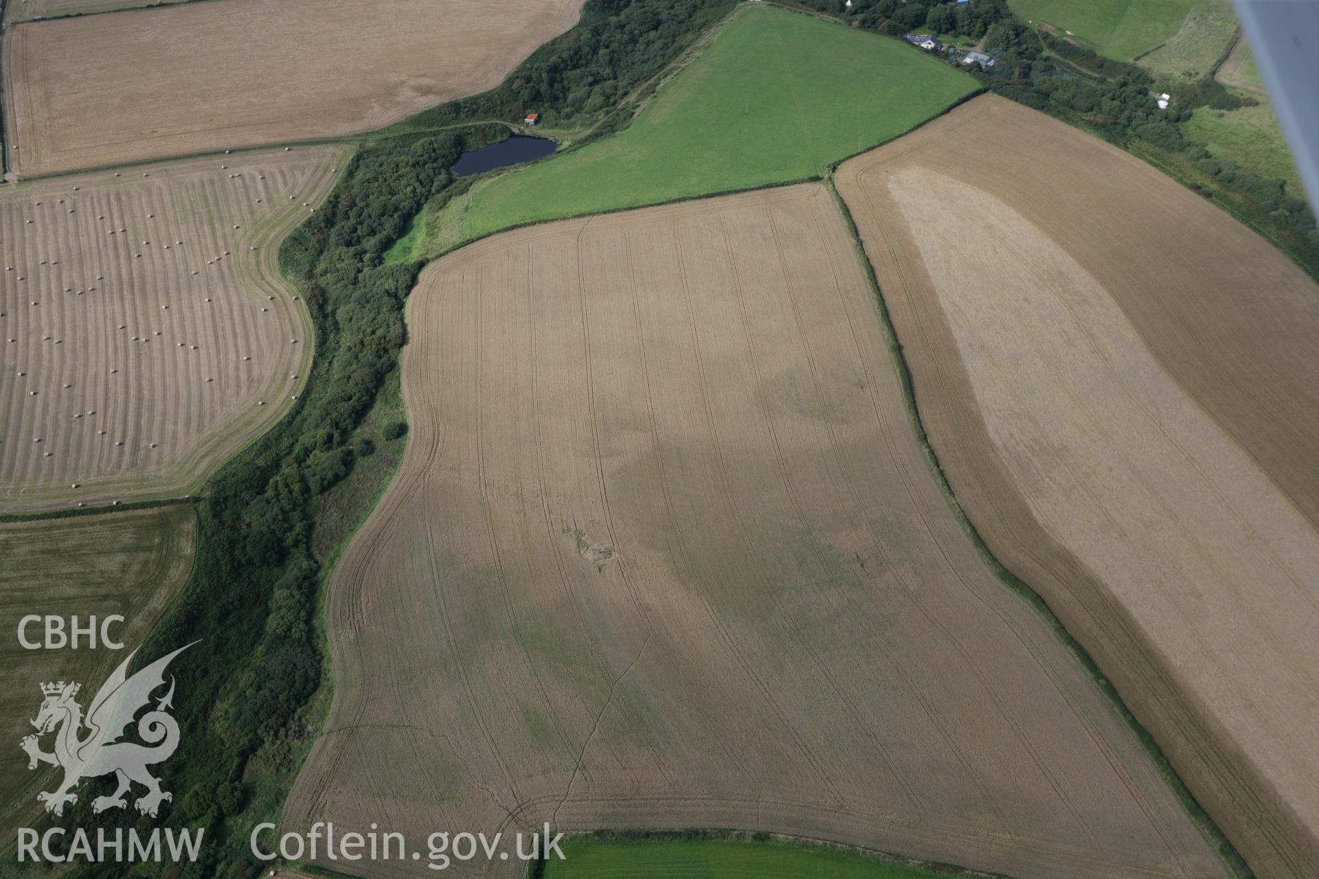 RCAHMW colour oblique photograph of Fields to the south of Abercastle village. Taken by Toby Driver on 09/09/2010.