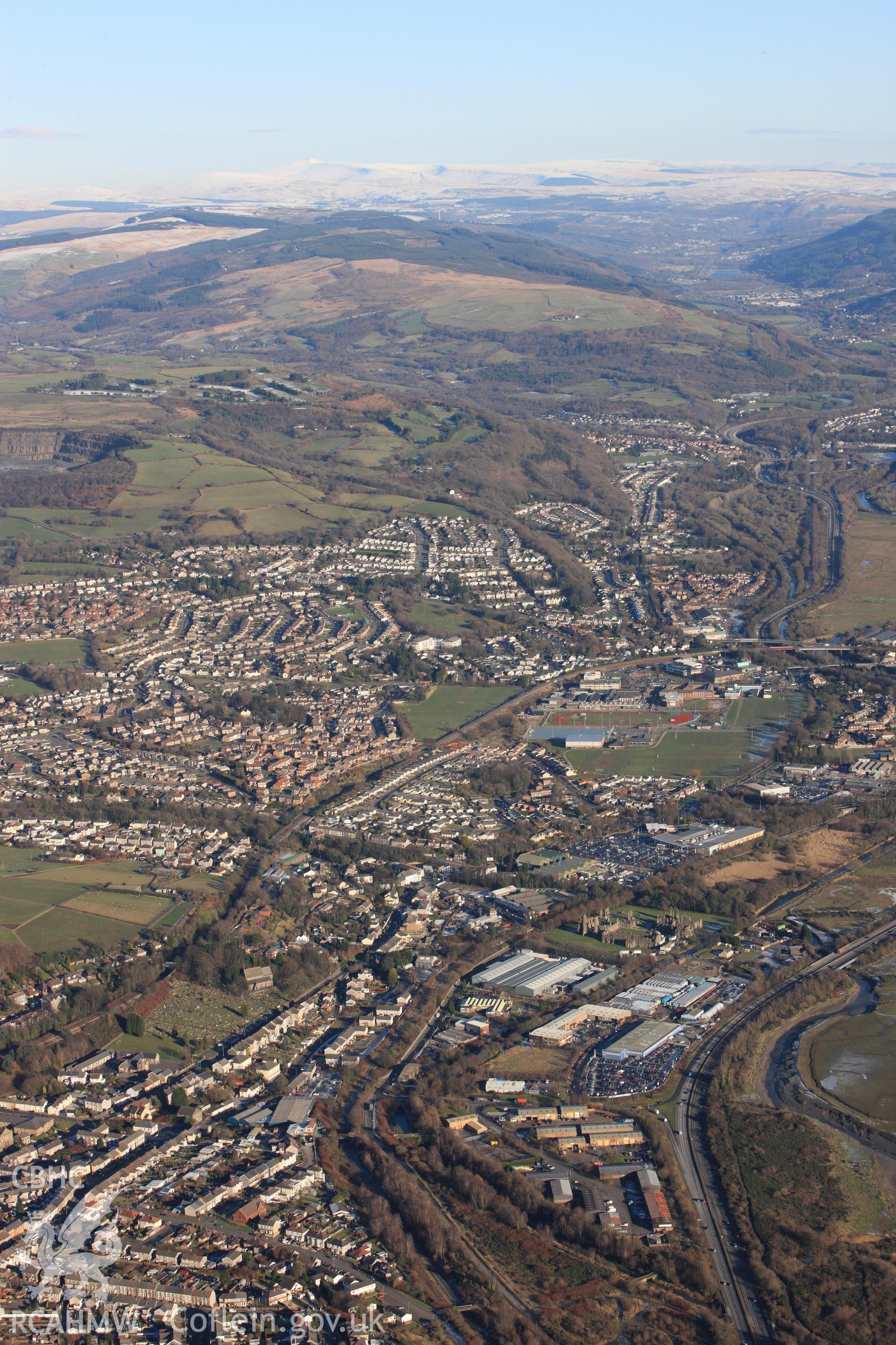 RCAHMW colour oblique photograph of Neath Auxiliary Fort, showing excavations. Taken by Toby Driver on 08/12/2010.