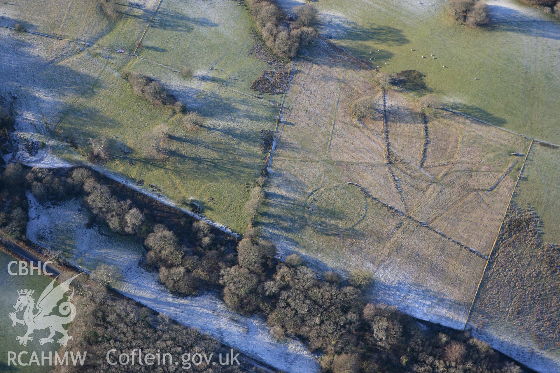 RCAHMW colour oblique photograph of tree planting circles, north-west of Clearbrook Woods, Middleton Hall Park. Taken by Toby Driver on 08/12/2010.