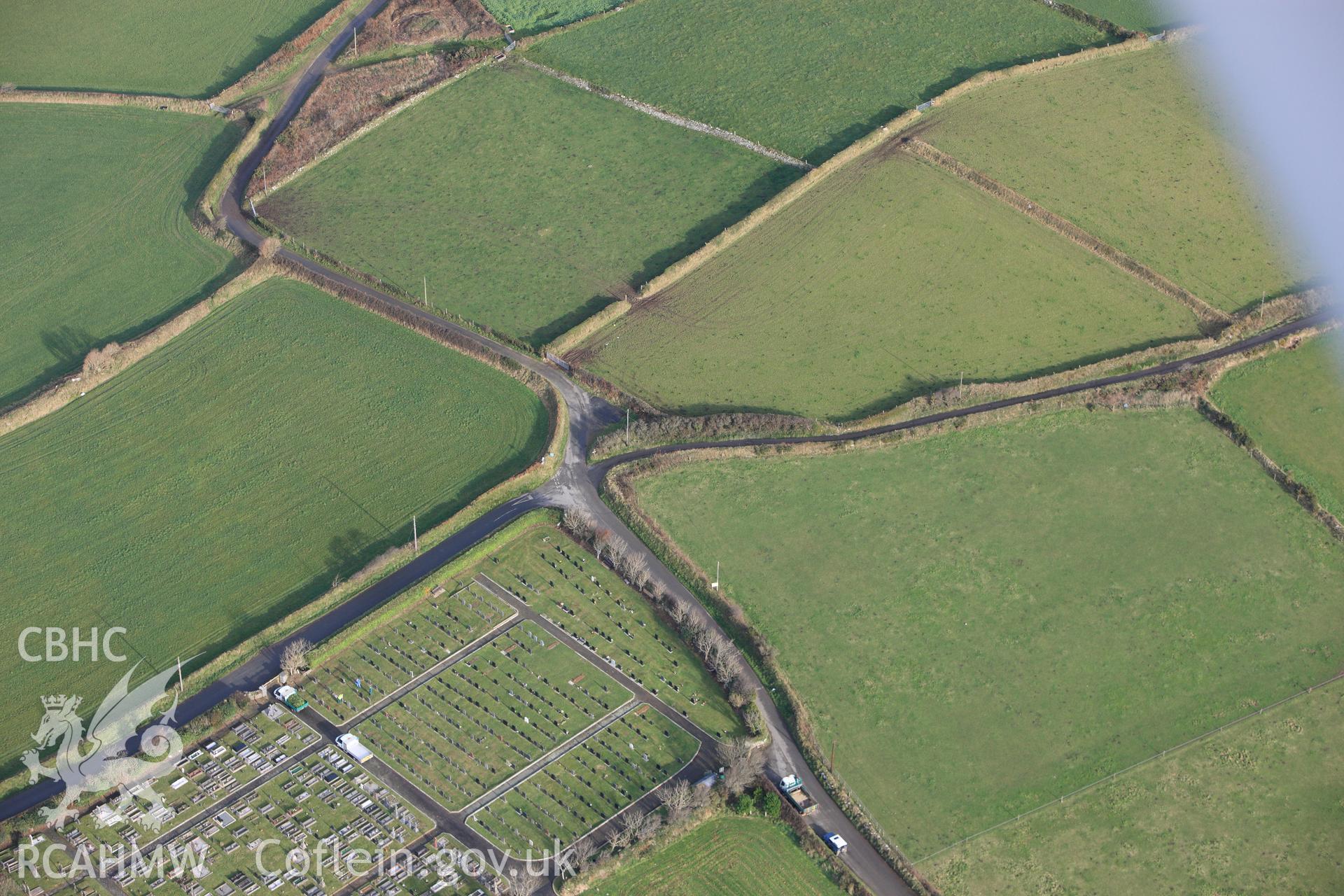 RCAHMW colour oblique photograph of Incised Cross at Cemetery Cross Roads, south-east of Llanwnda. Taken by Toby Driver on 16/11/2010.