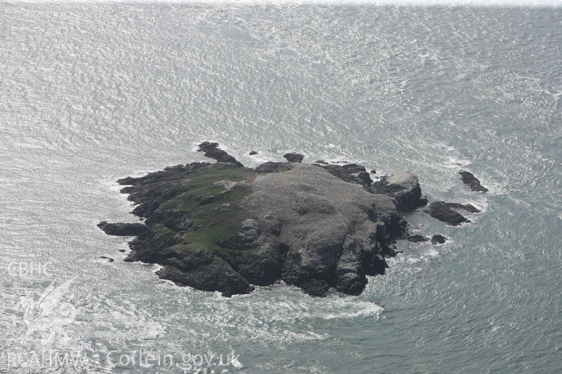 RCAHMW colour oblique photograph of Grassholm Island Settlement. Taken by Toby Driver on 09/09/2010.