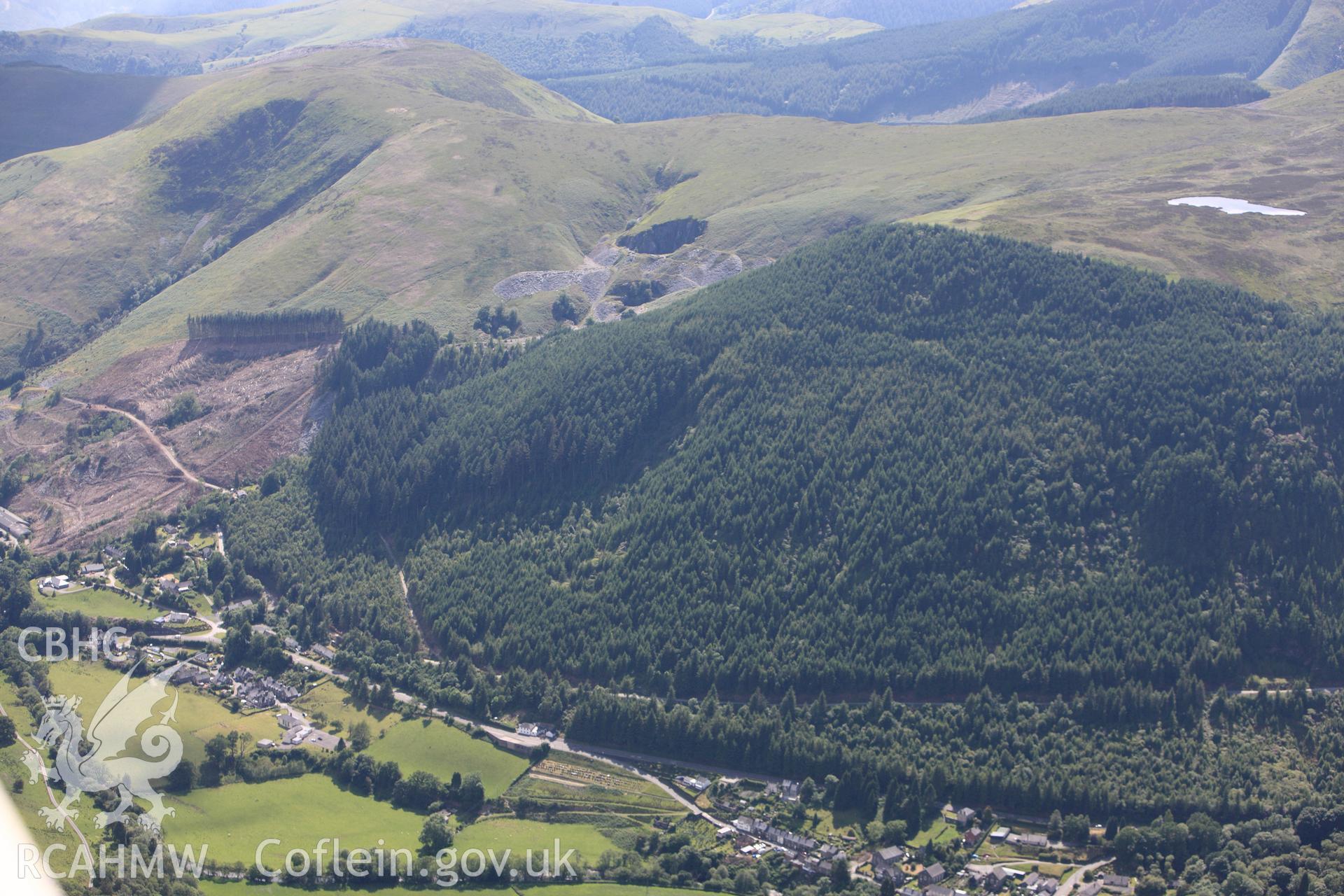 RCAHMW colour oblique photograph of Dinas Mawddwy, from the east. Taken by Toby Driver on 16/06/2010.