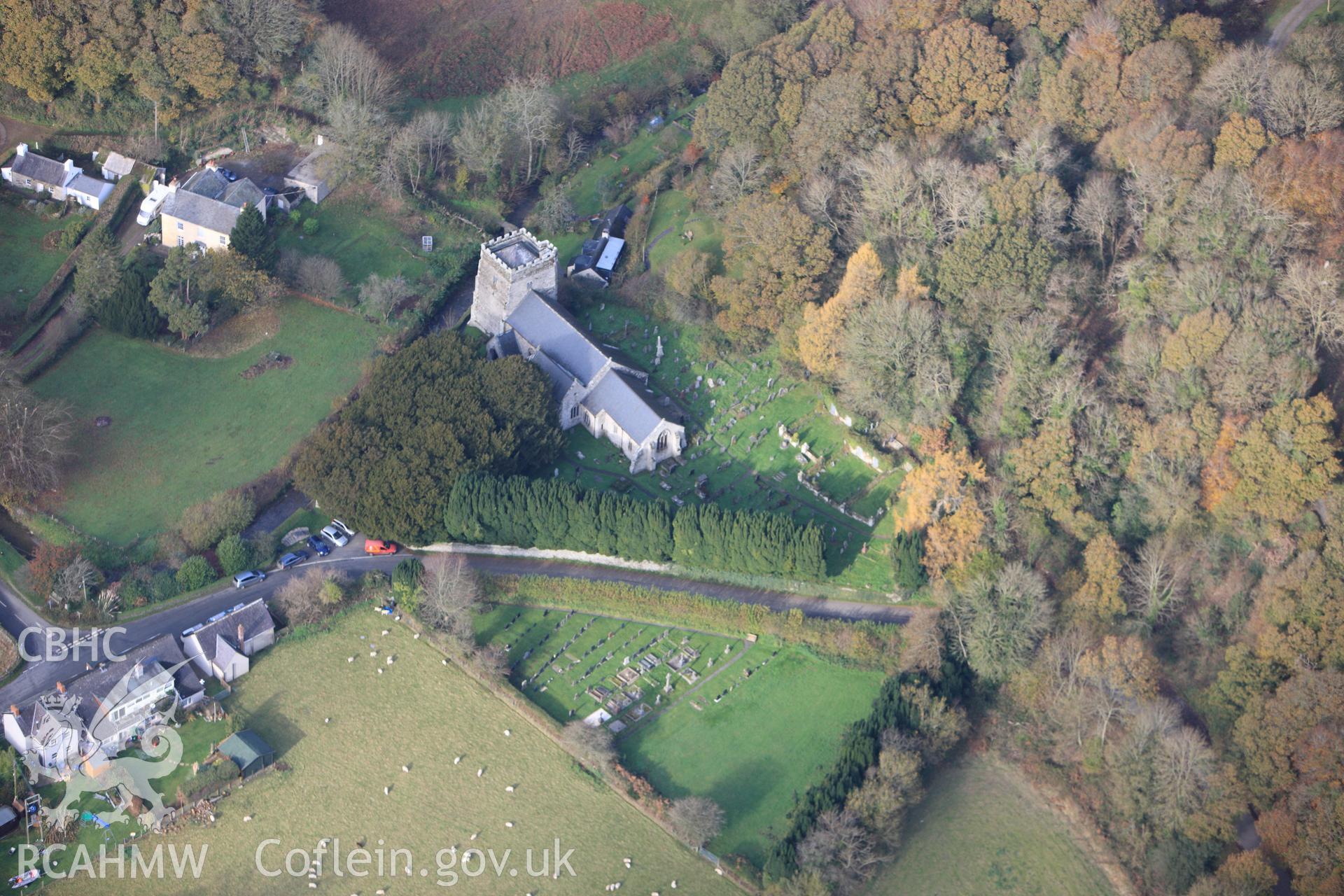 RCAHMW colour oblique photograph of St Brynach's Church, with Inscribed Stone and High Cross in the churchyard. Taken by Toby Driver on 16/11/2010.